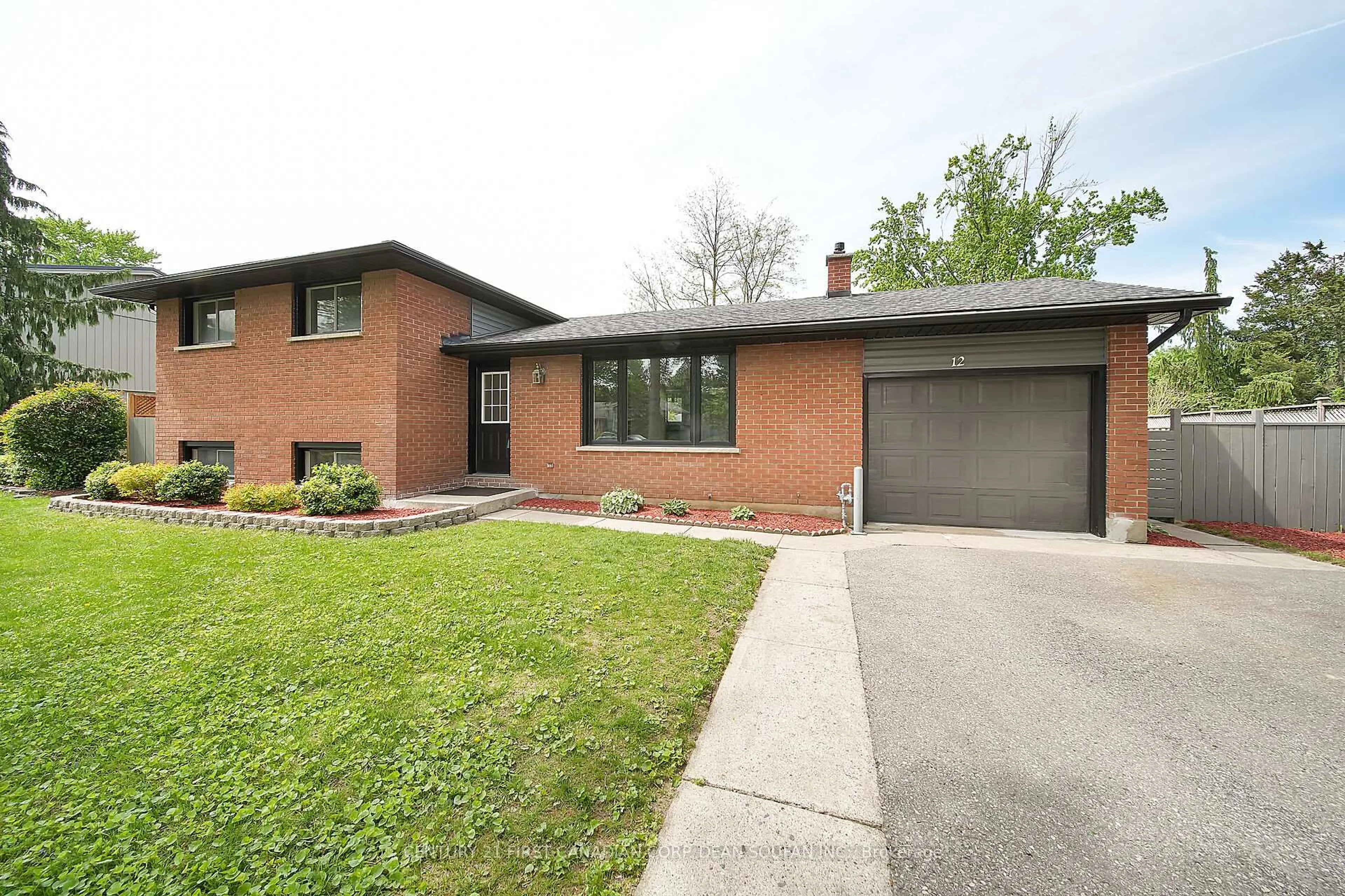Home with brick exterior material, street for 12 Field Rd, London South Ontario N6P 1C5