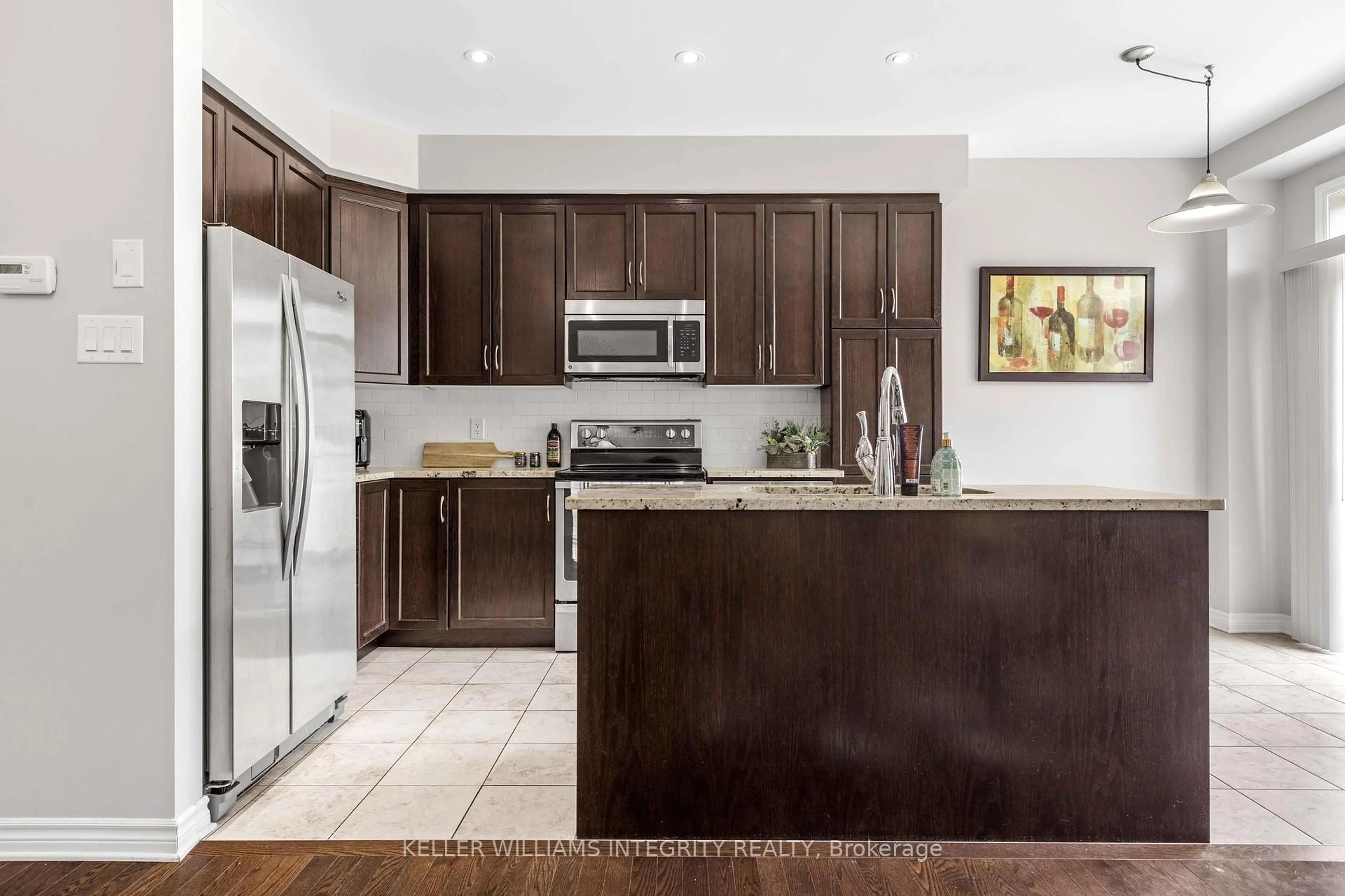 Open concept kitchen, ceramic/tile floor for 556 Via Mattino Way, Ottawa Ontario K2H 8S1