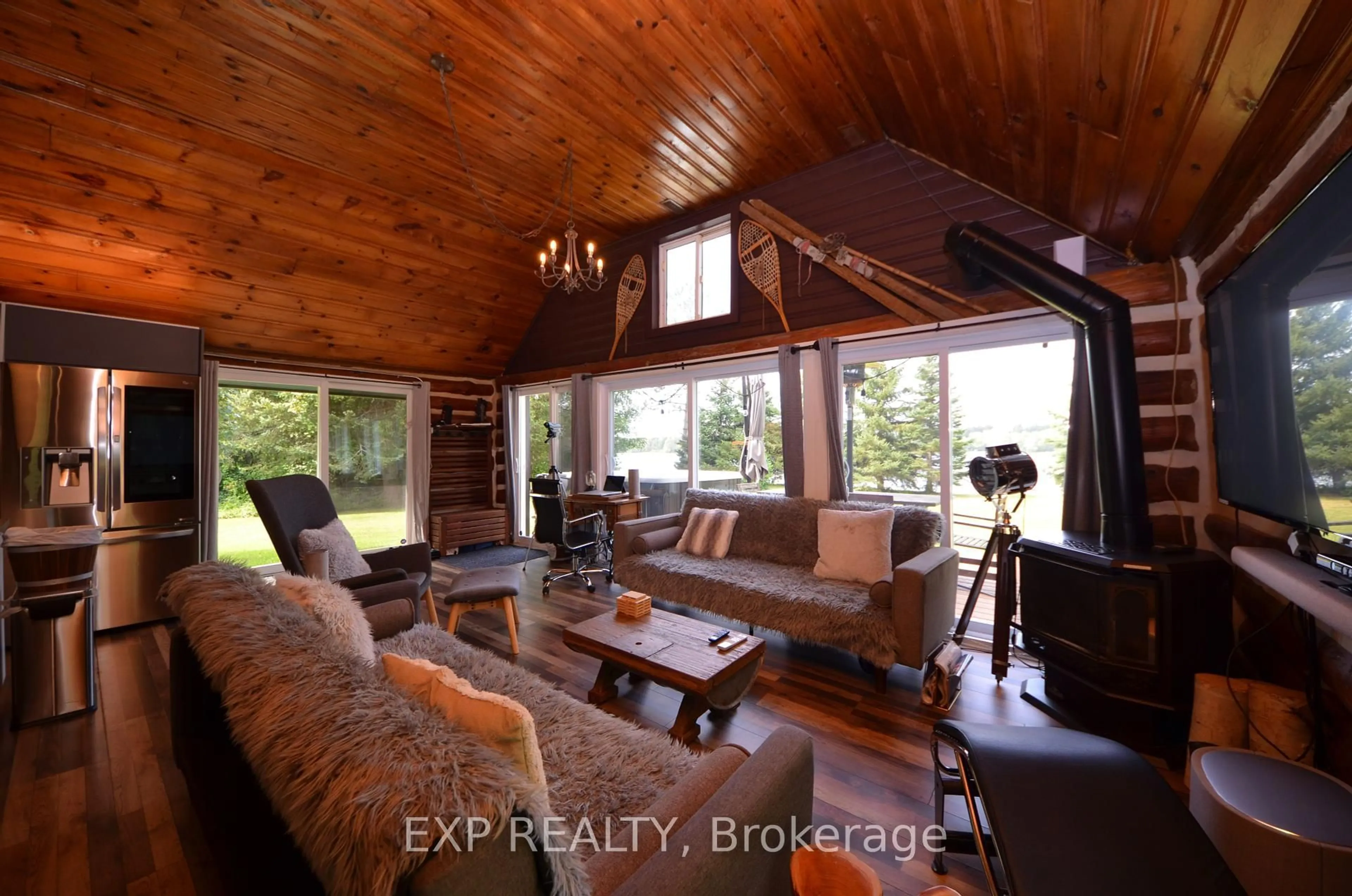 Living room with furniture, wood/laminate floor for 110 Honour Way, North Grenville Ontario K0G 1J0