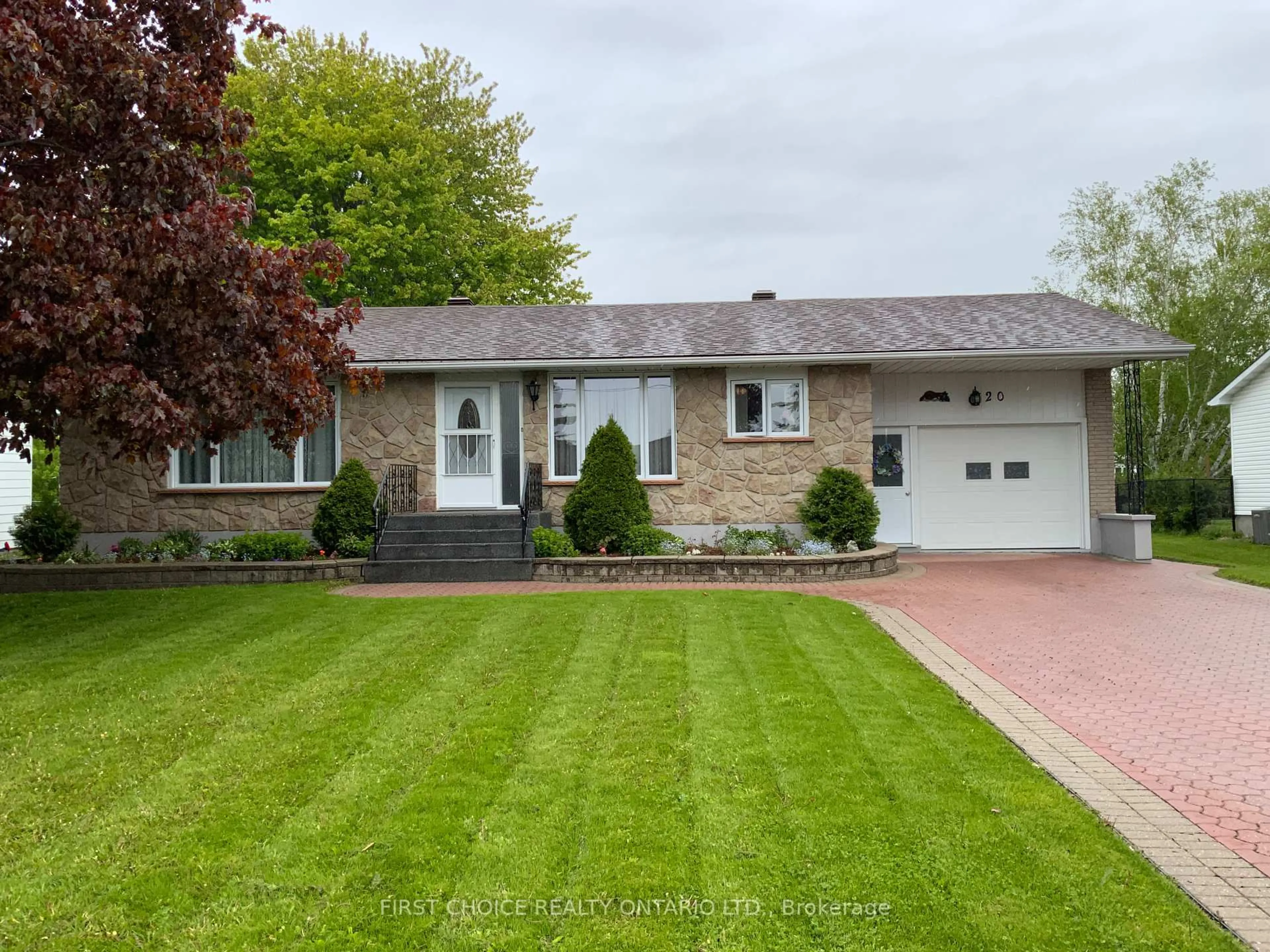 Home with vinyl exterior material, street for 20 Dollard St, Russell Ontario K0A 1W0