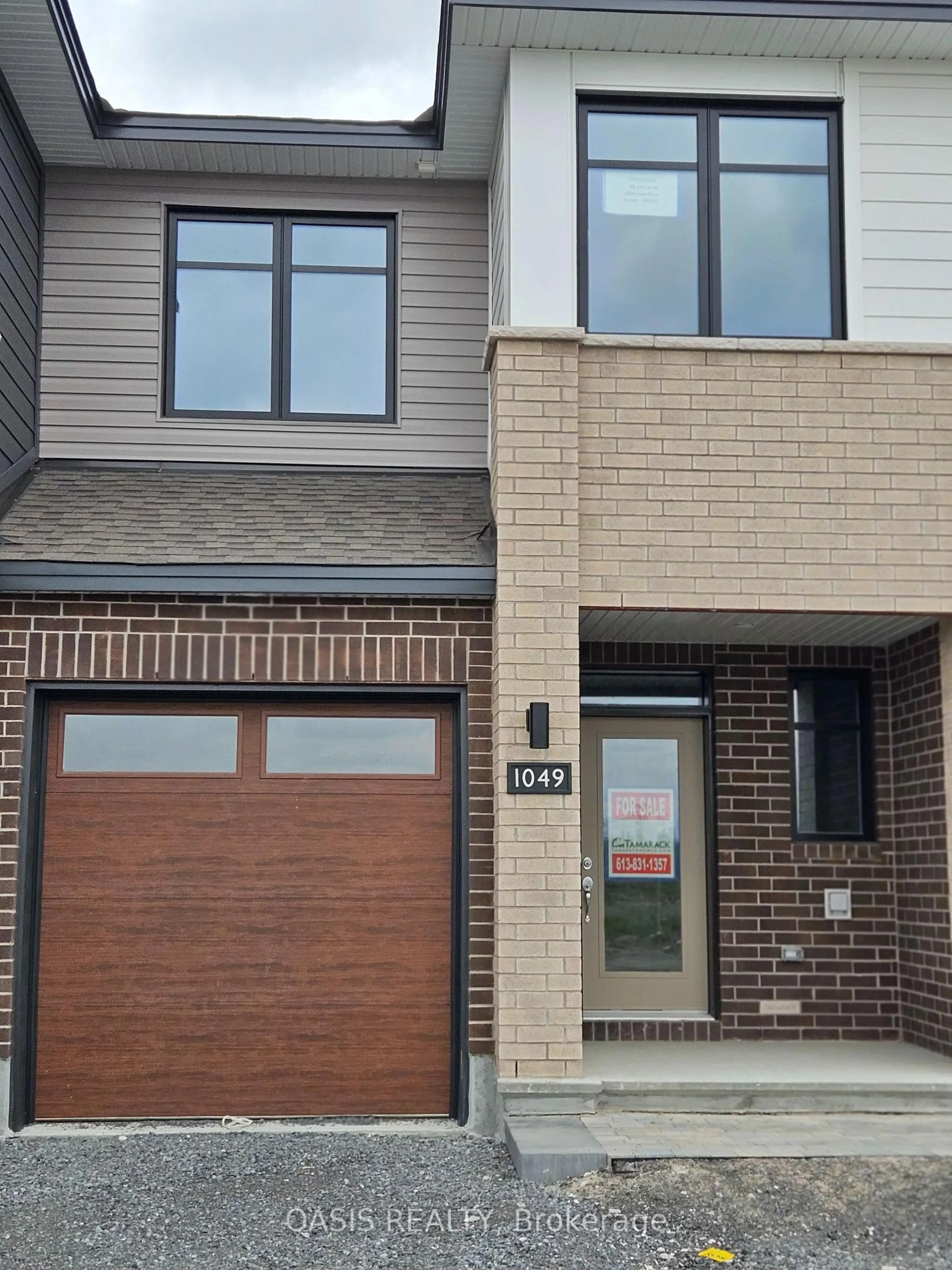Home with brick exterior material, street for 1049 Cope Dr, Stittsville Ontario K2S 3B5