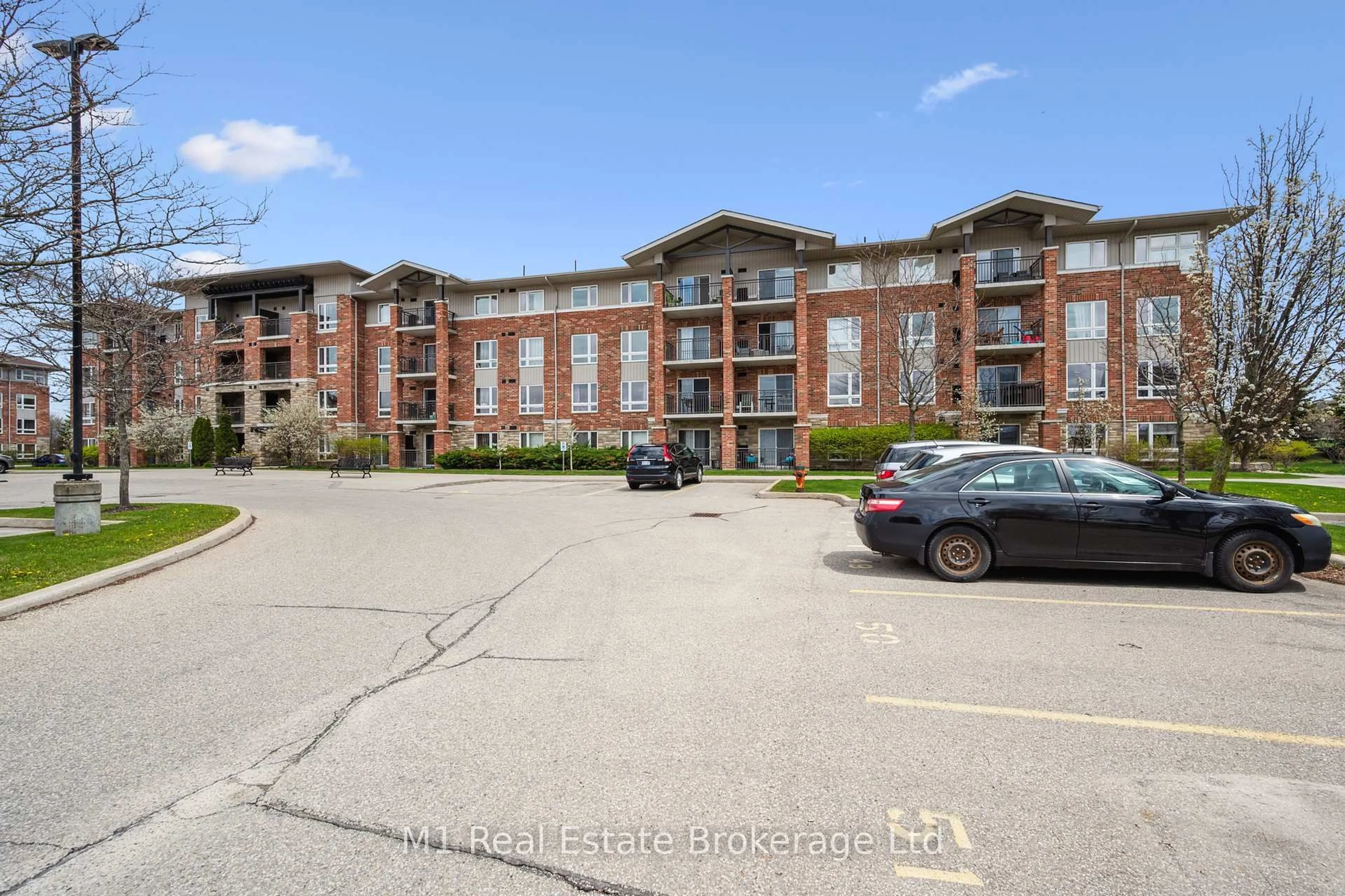A pic from outside/outdoor area/front of a property/back of a property/a pic from drone, building for 19 Waterford Dr #105, Guelph Ontario N1L 0G8