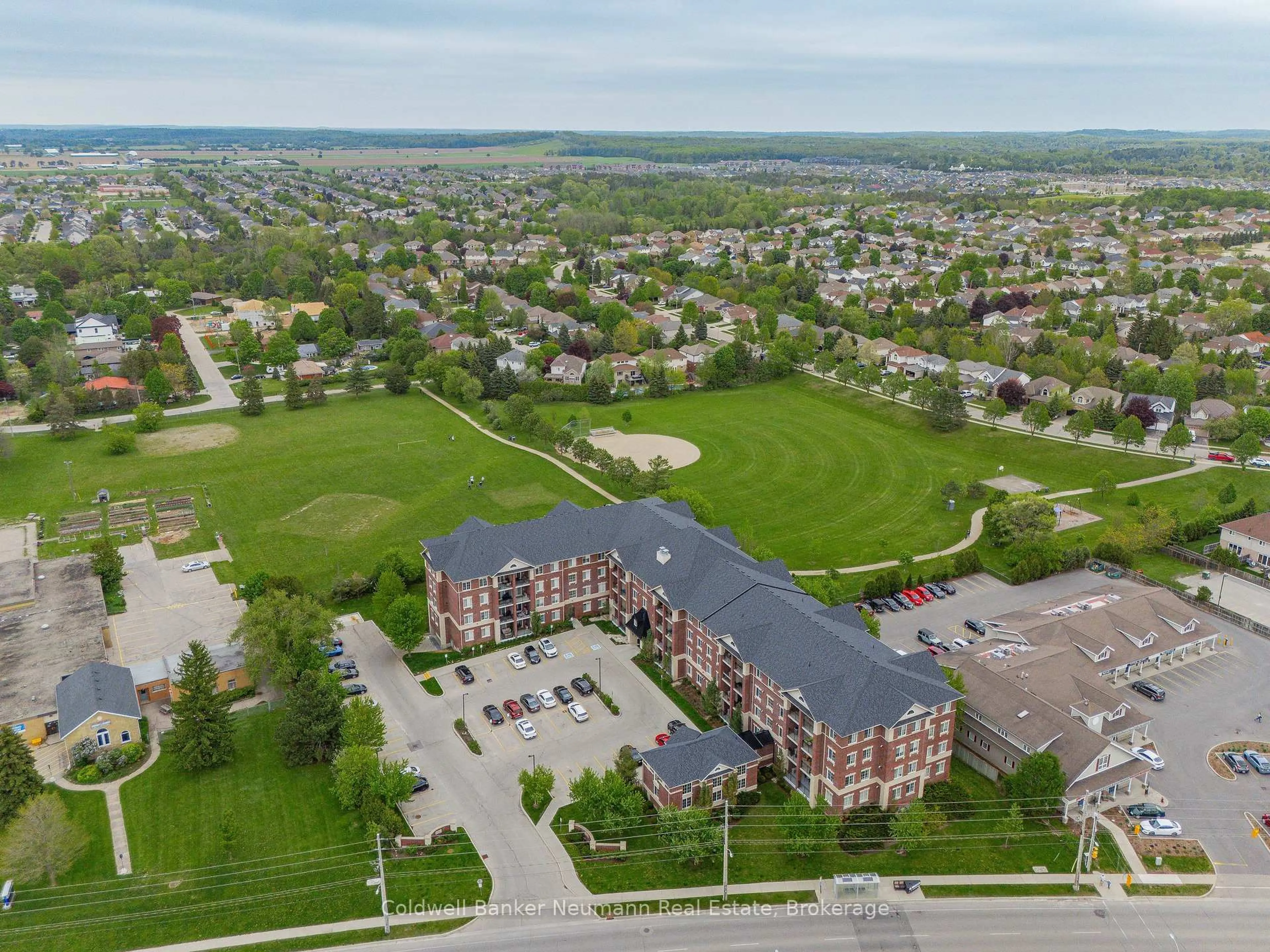 A pic from outside/outdoor area/front of a property/back of a property/a pic from drone, unknown for 1440 Gordon St #116, Guelph Ontario N1L 1C8