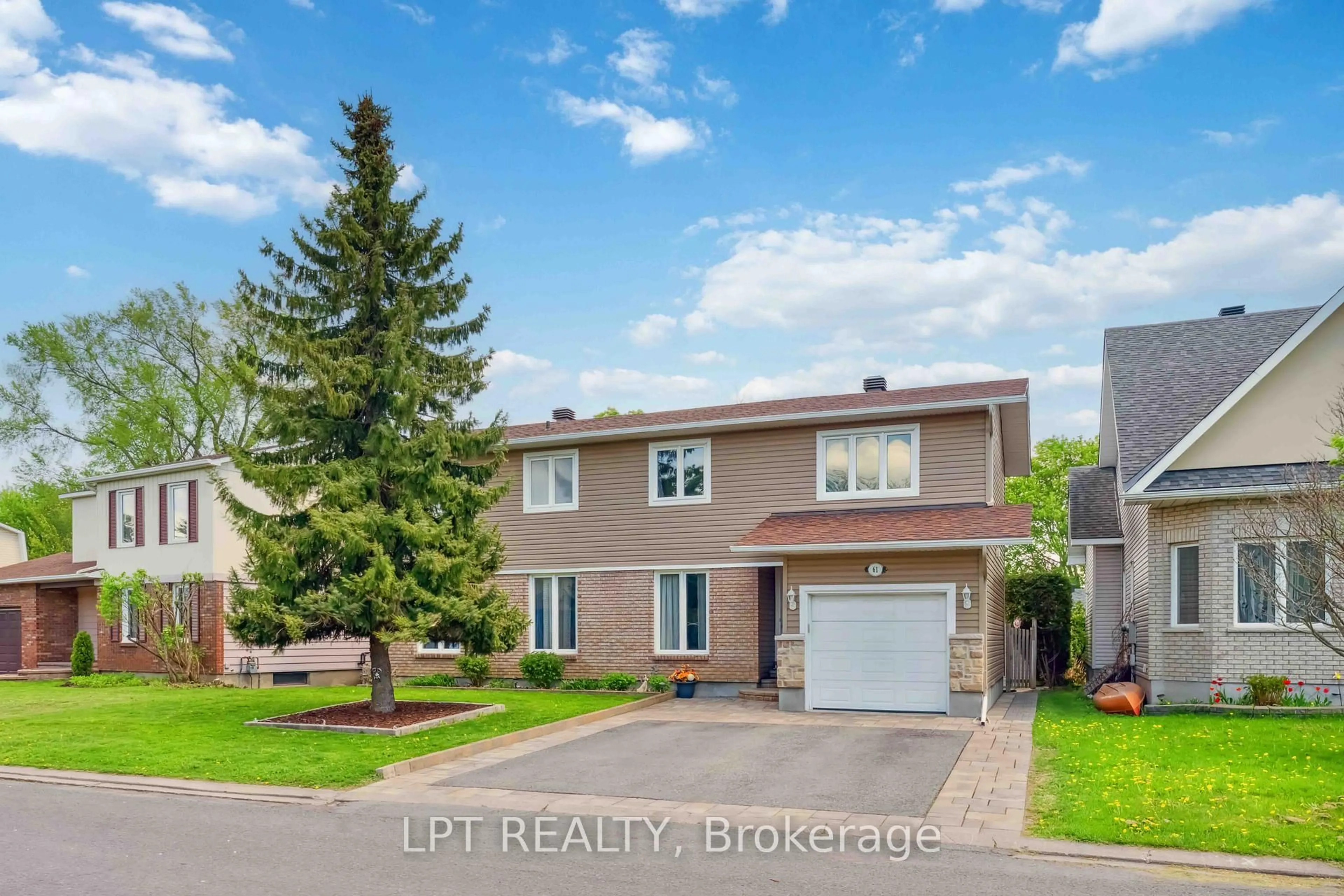 Home with vinyl exterior material, street for 61 Fieldgate Dr, Ottawa Ontario K2J 1V3