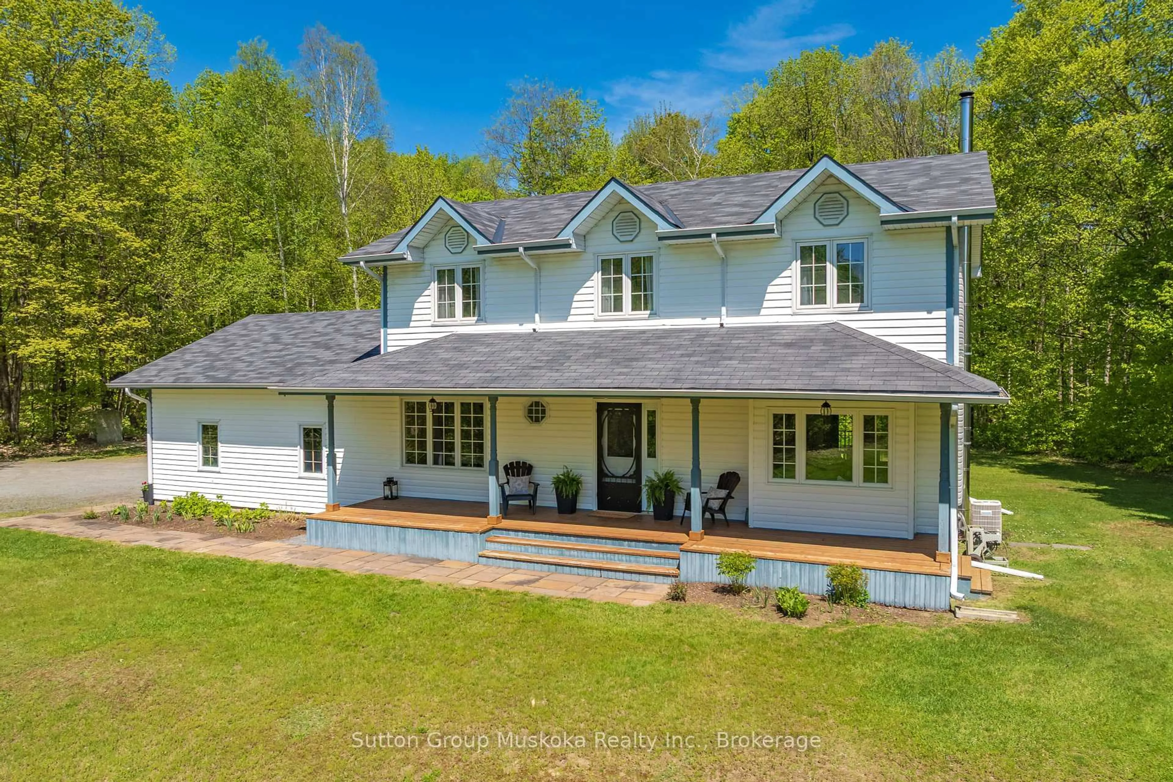 A pic from outside/outdoor area/front of a property/back of a property/a pic from drone, unknown for 240 Madill Church Rd, Huntsville Ontario P1H 1A1