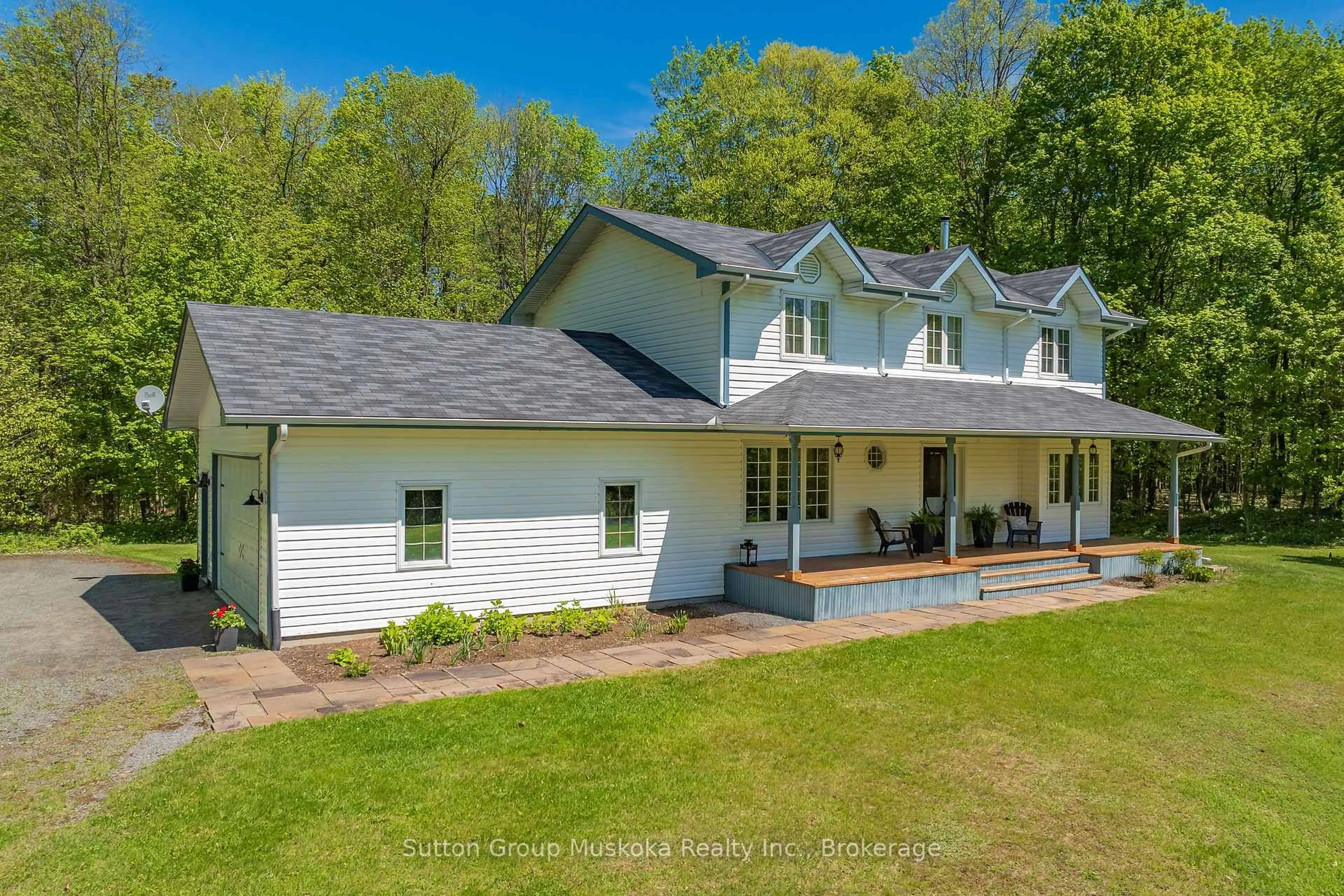A pic from outside/outdoor area/front of a property/back of a property/a pic from drone, unknown for 240 Madill Church Rd, Huntsville Ontario P1H 1A1