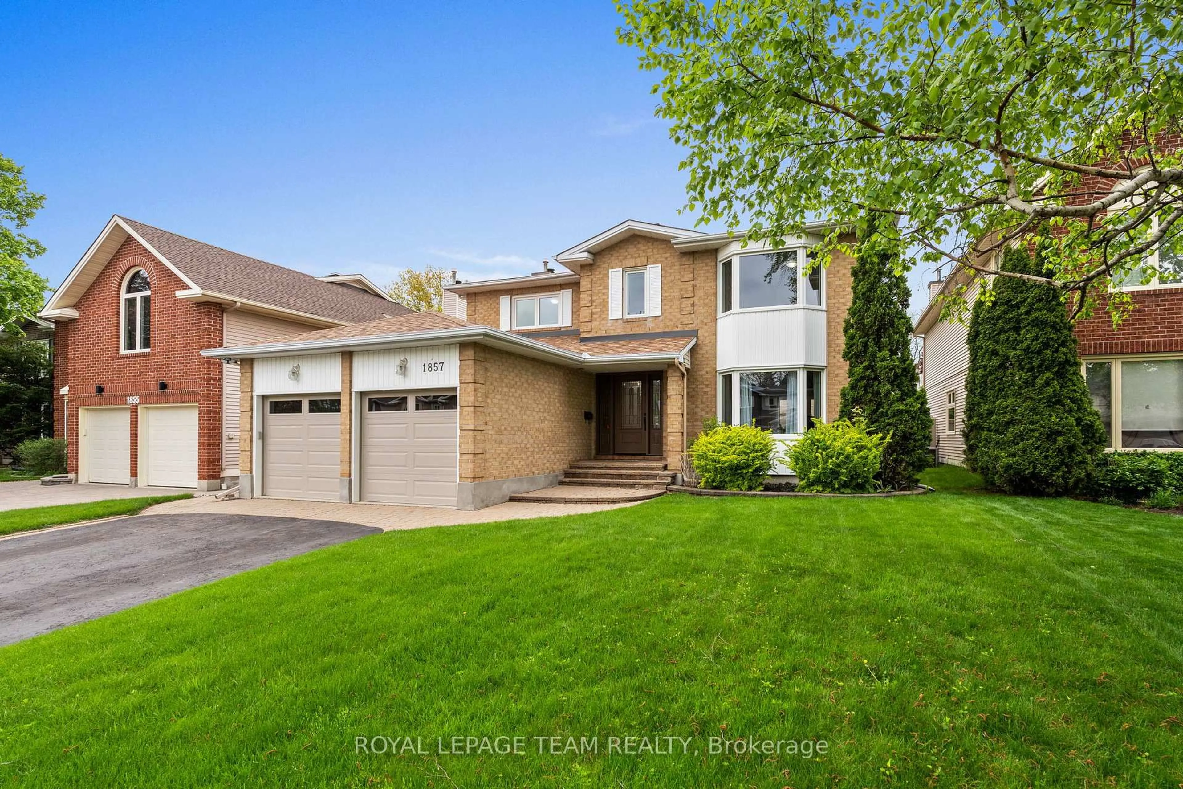 Home with brick exterior material, street for 1857 Hunters Run Dr, Orleans Ontario K1C 6X5