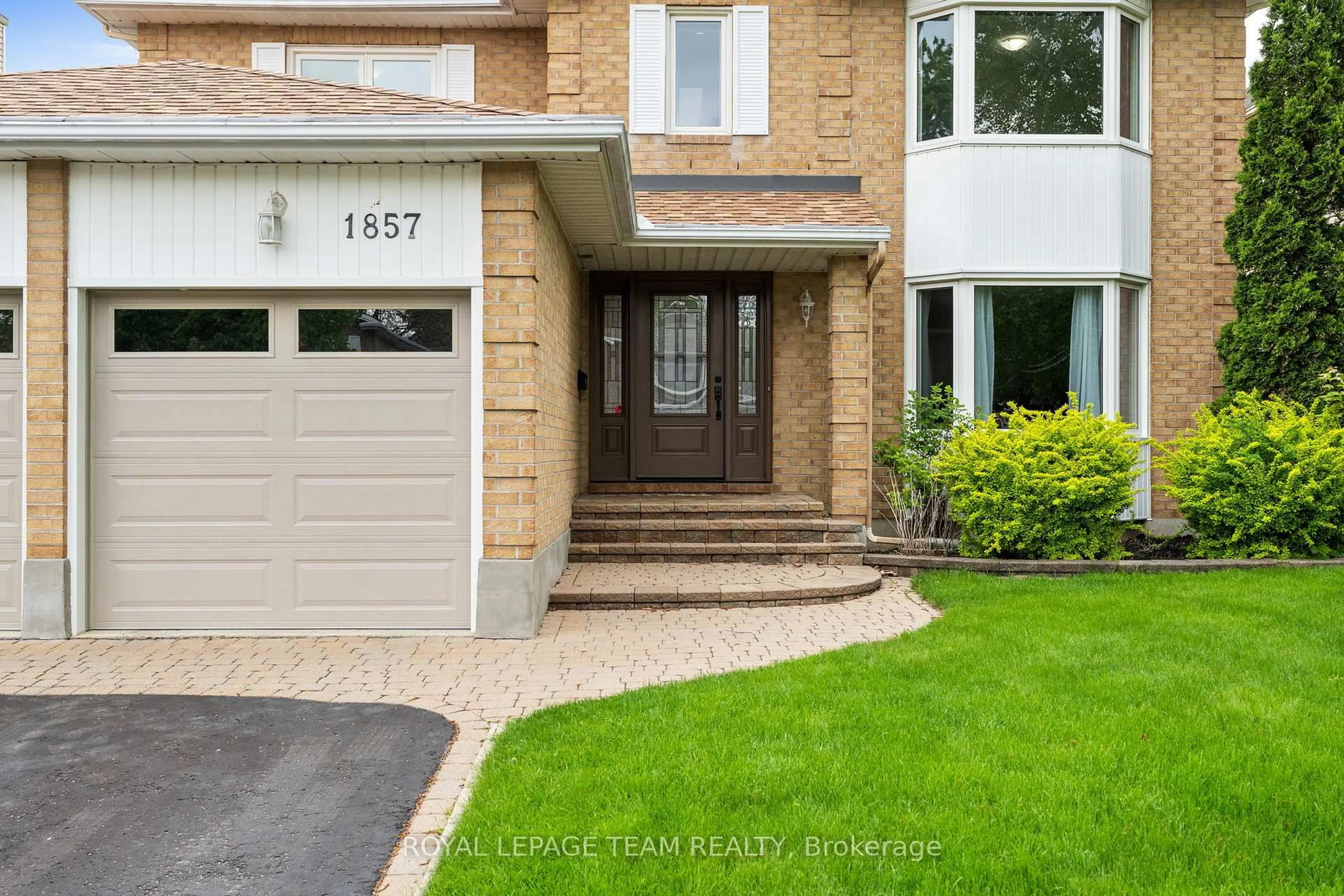 Home with brick exterior material, street for 1857 Hunters Run Dr, Orleans Ontario K1C 6X5