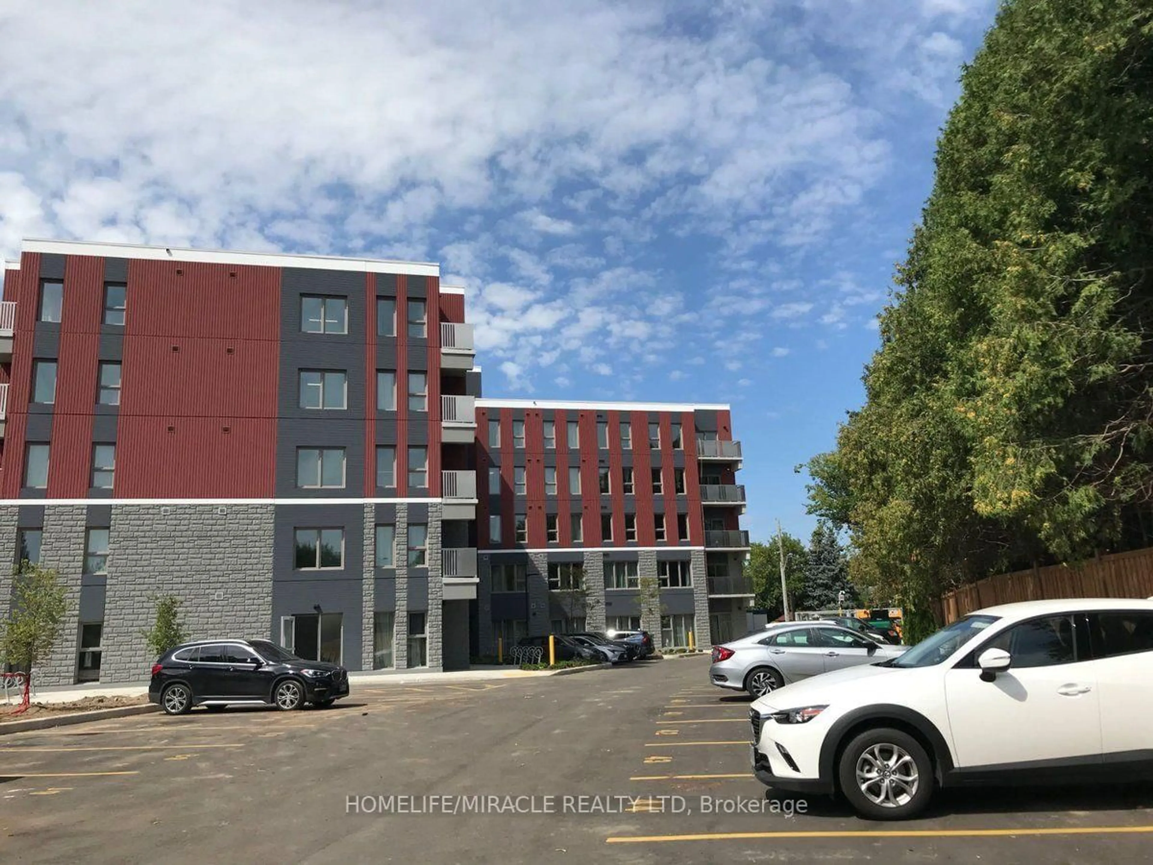 A pic from outside/outdoor area/front of a property/back of a property/a pic from drone, unknown for 77 Leland St #406, Hamilton Ontario L8S 3A1