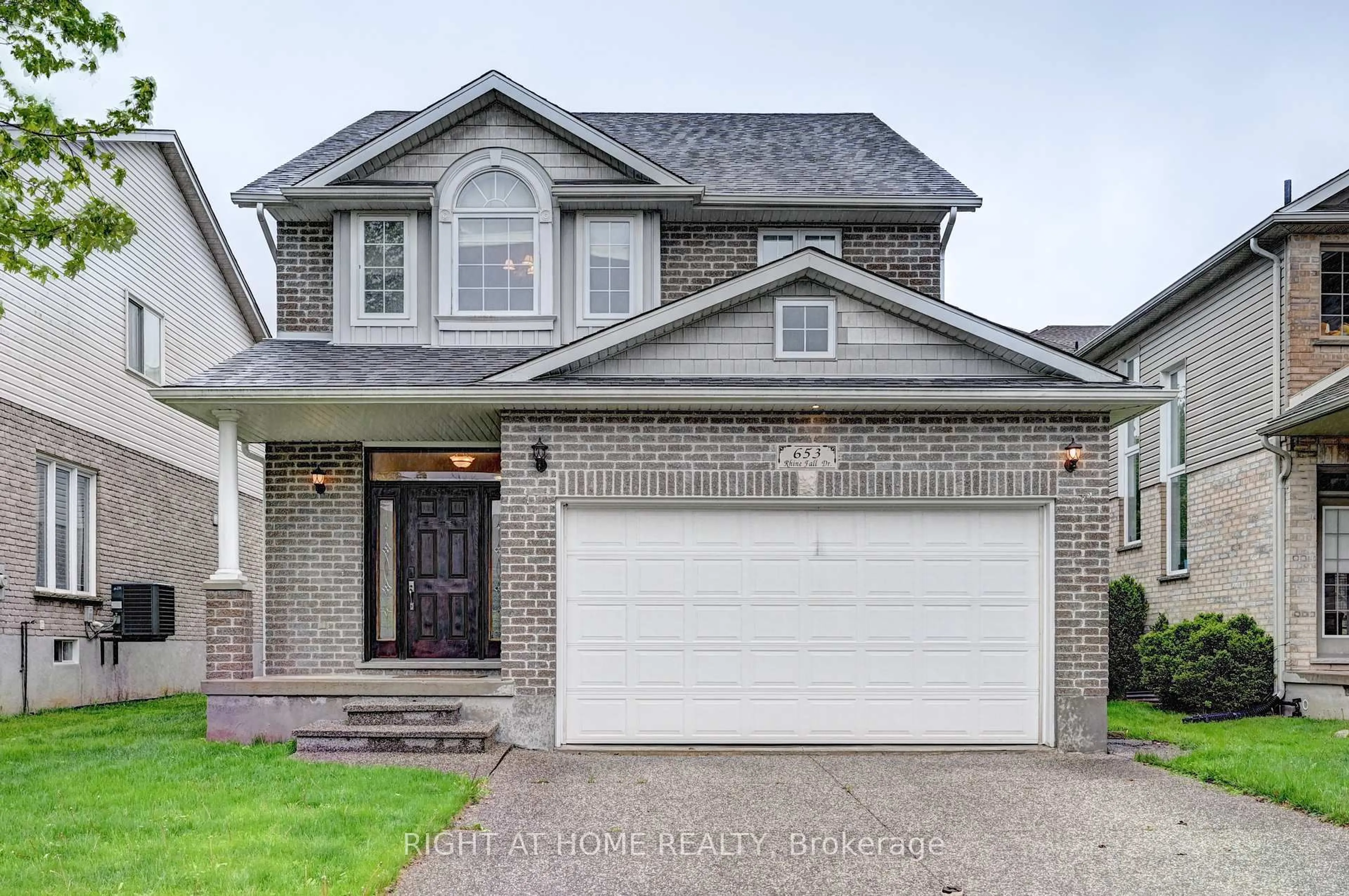 Home with brick exterior material, street for 653 Rhine Fall Dr, Waterloo Ontario N2V 2S8