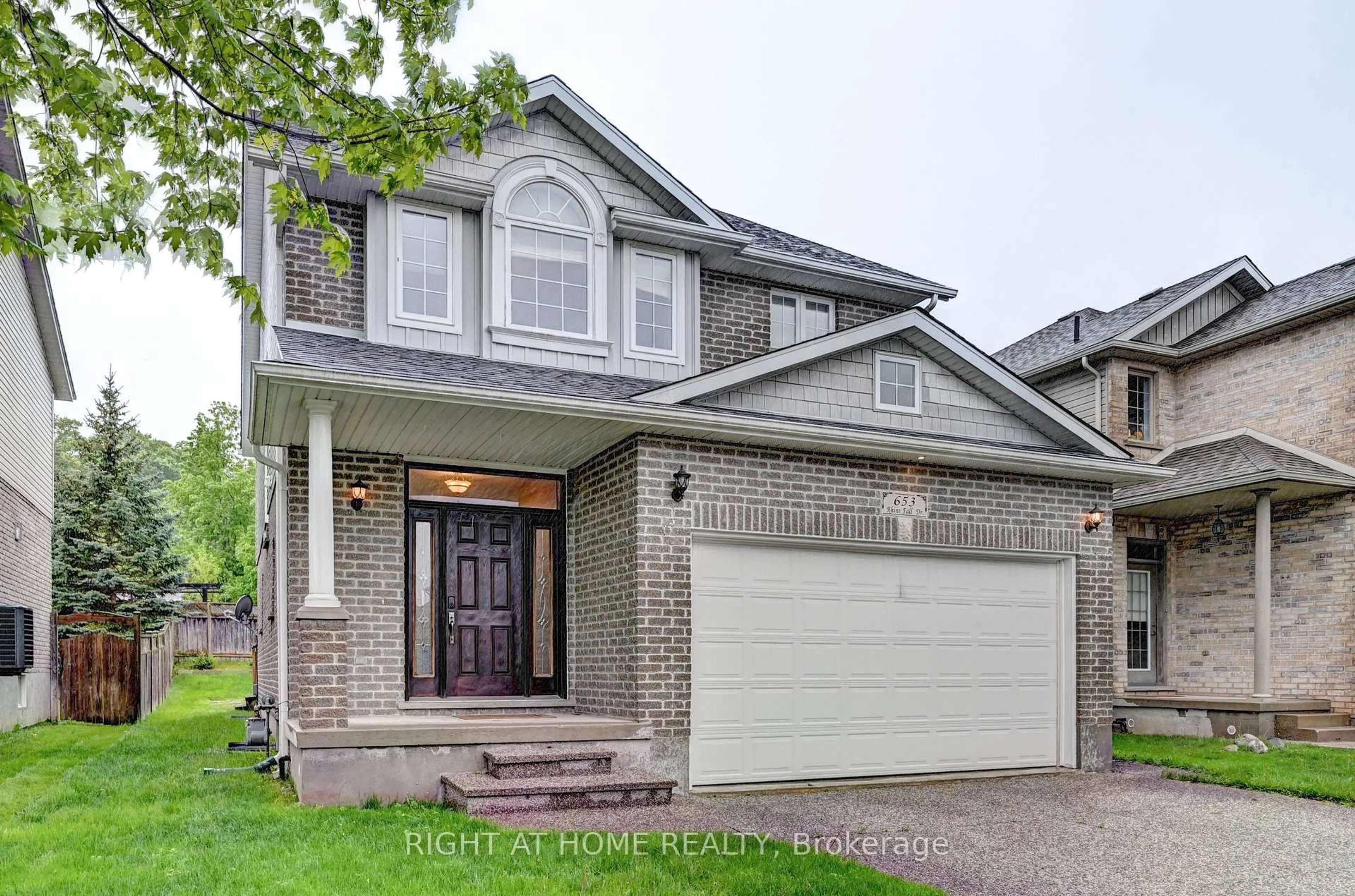 Home with brick exterior material, street for 653 Rhine Fall Dr, Waterloo Ontario N2V 2S8