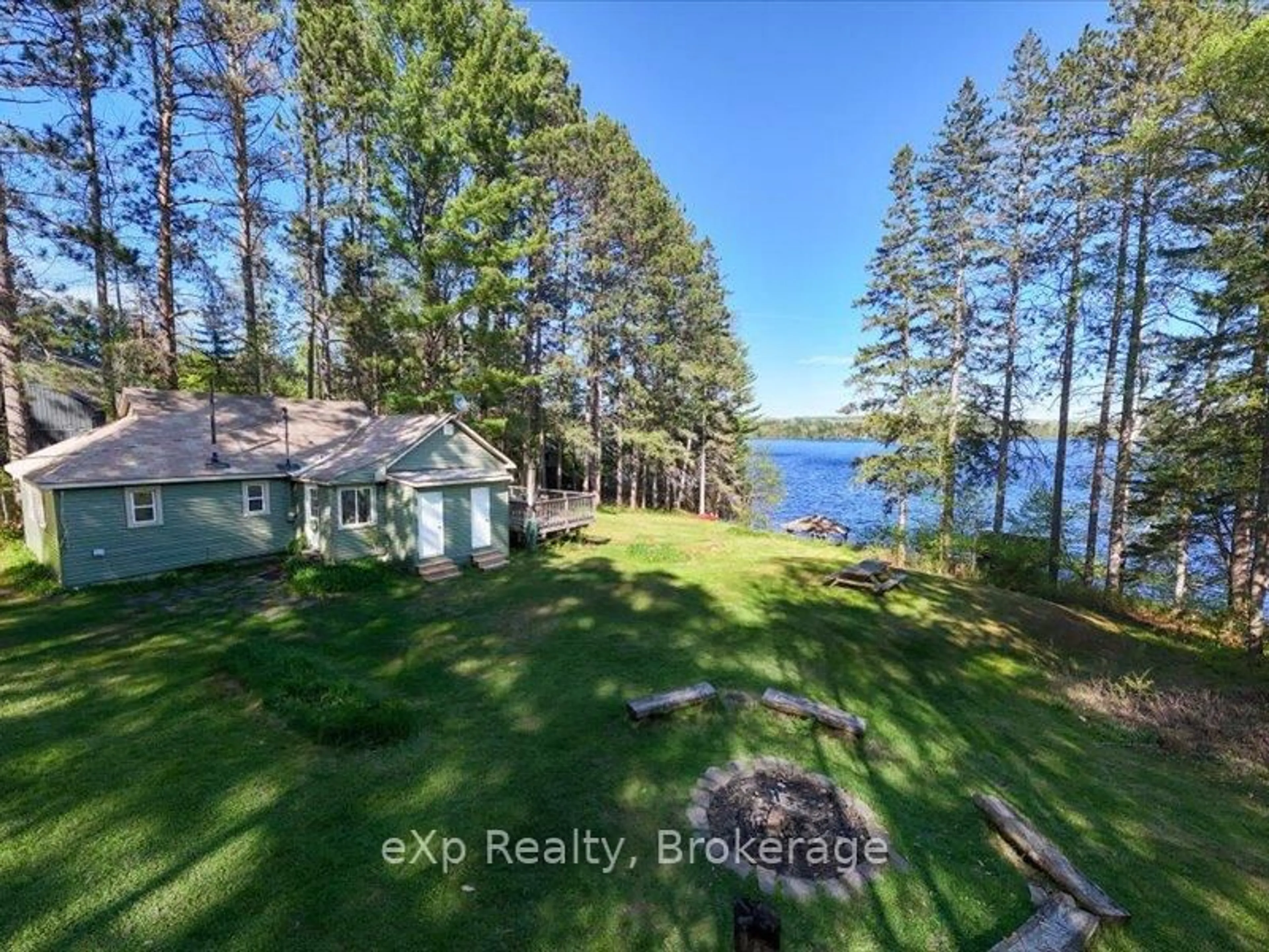 A pic from outside/outdoor area/front of a property/back of a property/a pic from drone, water/lake/river/ocean view for 1225 Ronville Rd, Lake of Bays Ontario P0A 1H0