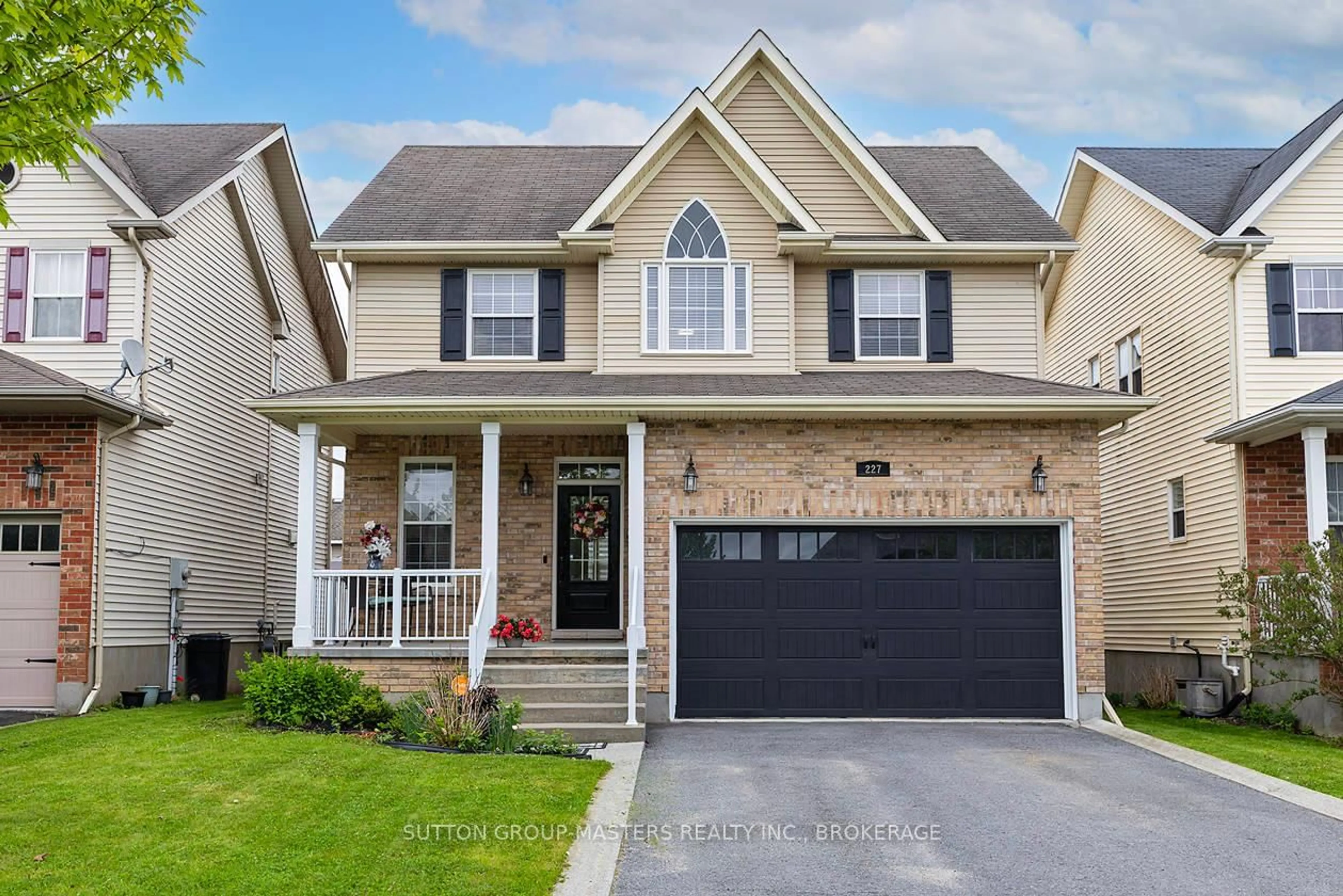 Home with brick exterior material, street for 227 Rose Abbey Dr, Kingston Ontario K7K 0A2