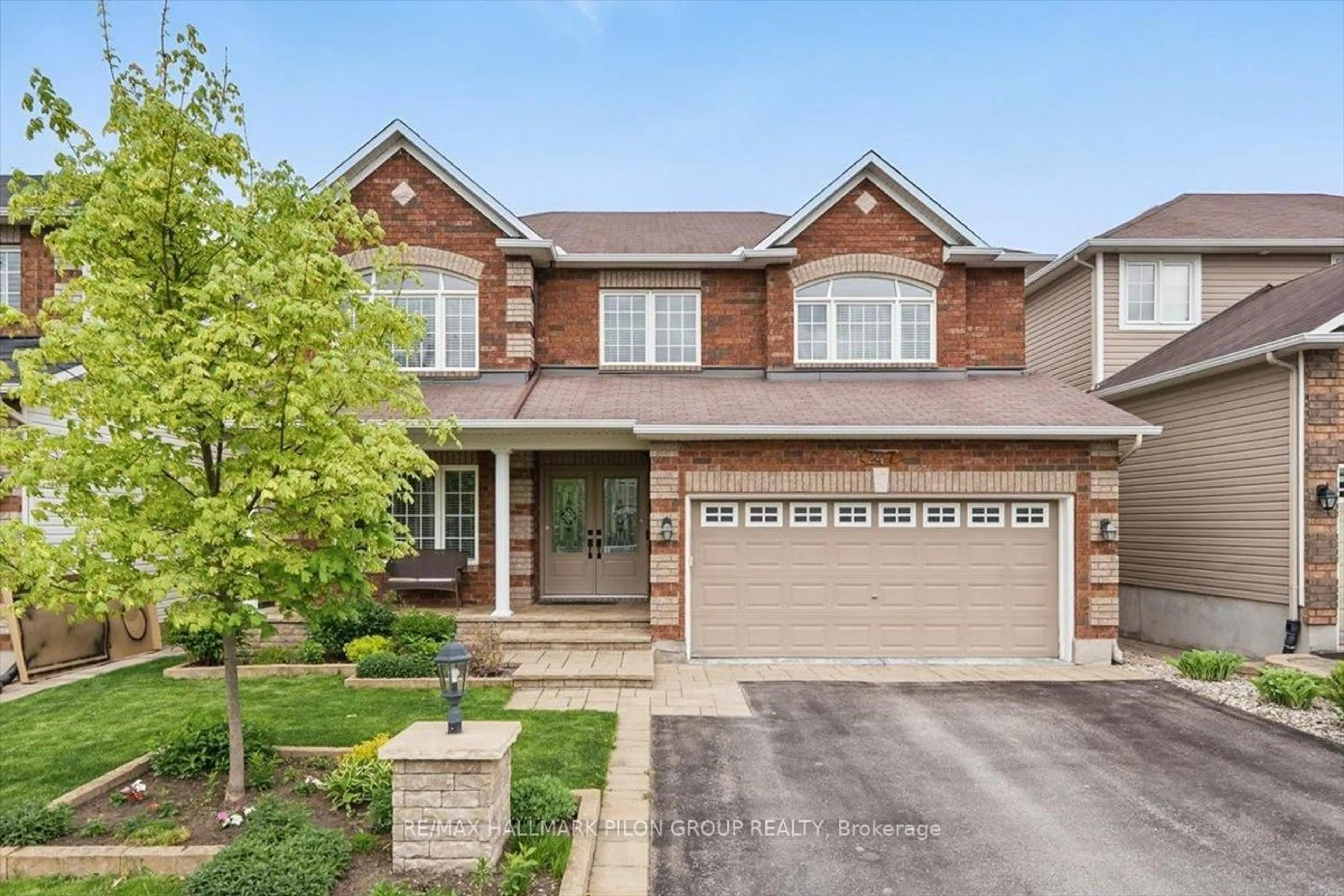 Home with brick exterior material, street for 247 Lucinda Cres, Ottawa Ontario K1W 0A3