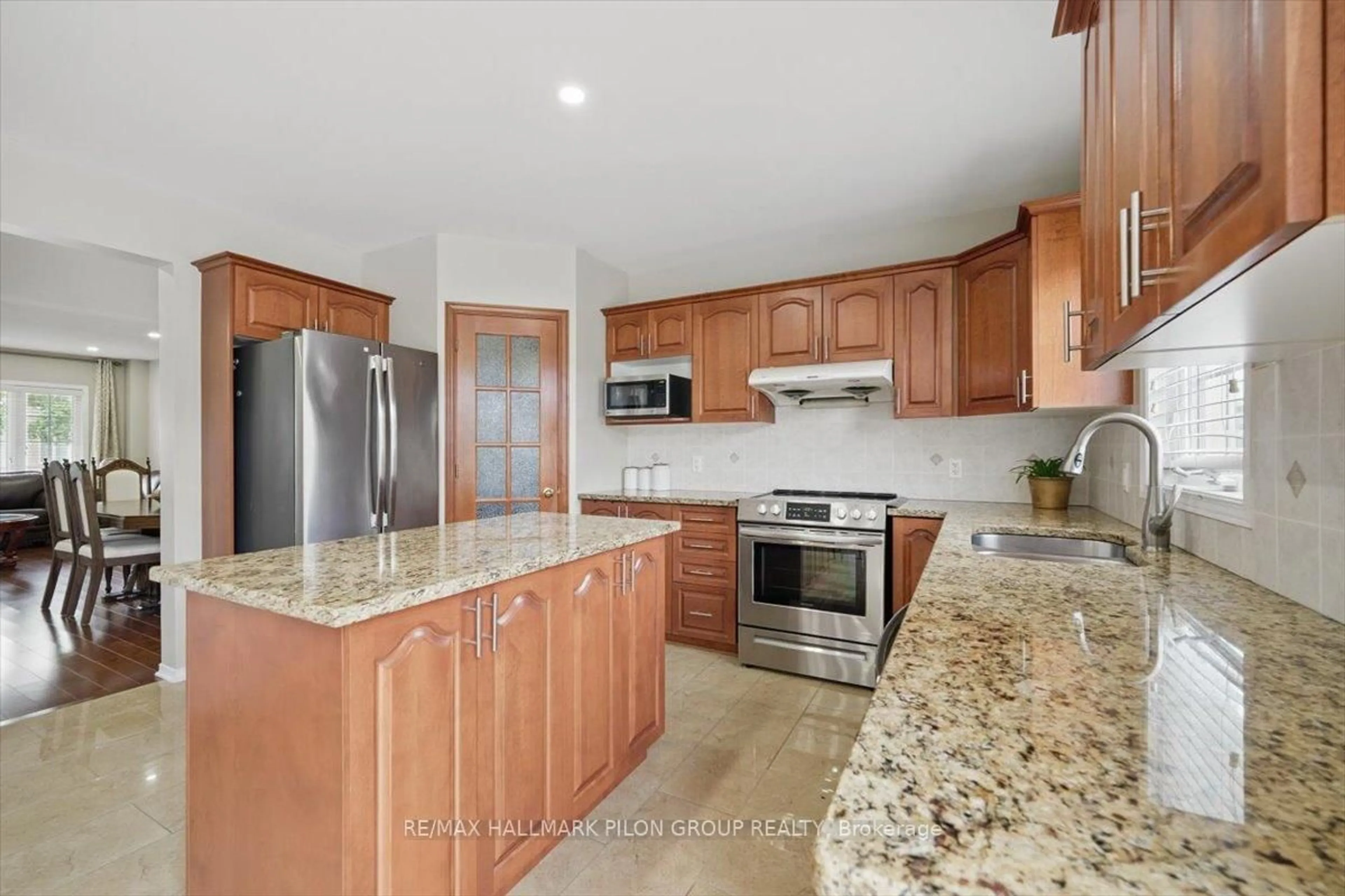 Open concept kitchen, ceramic/tile floor for 247 Lucinda Cres, Ottawa Ontario K1W 0A3