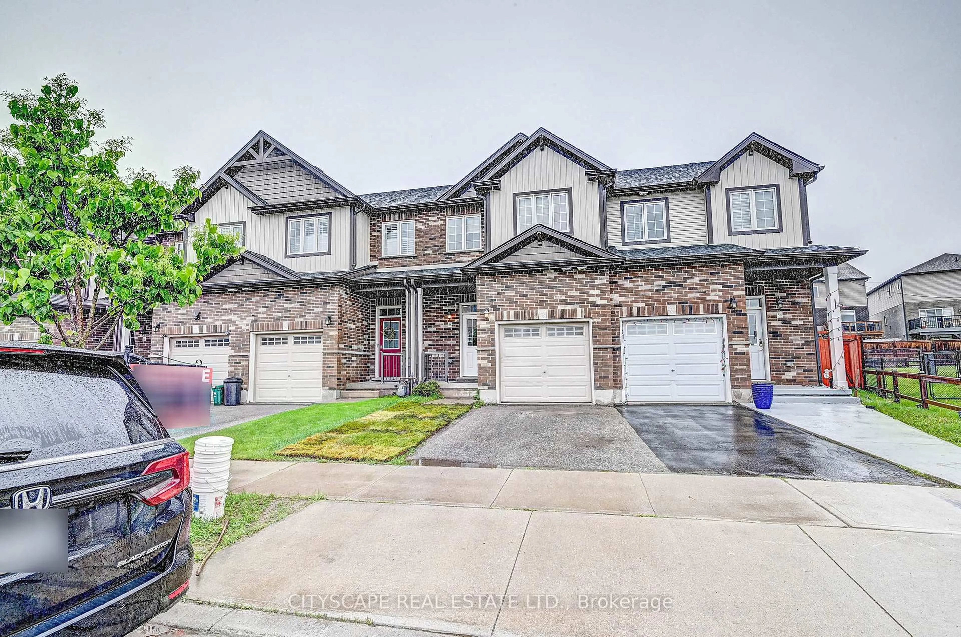 Home with brick exterior material, street for 58 Renfrew St, Kitchener Ontario N2R 0G5