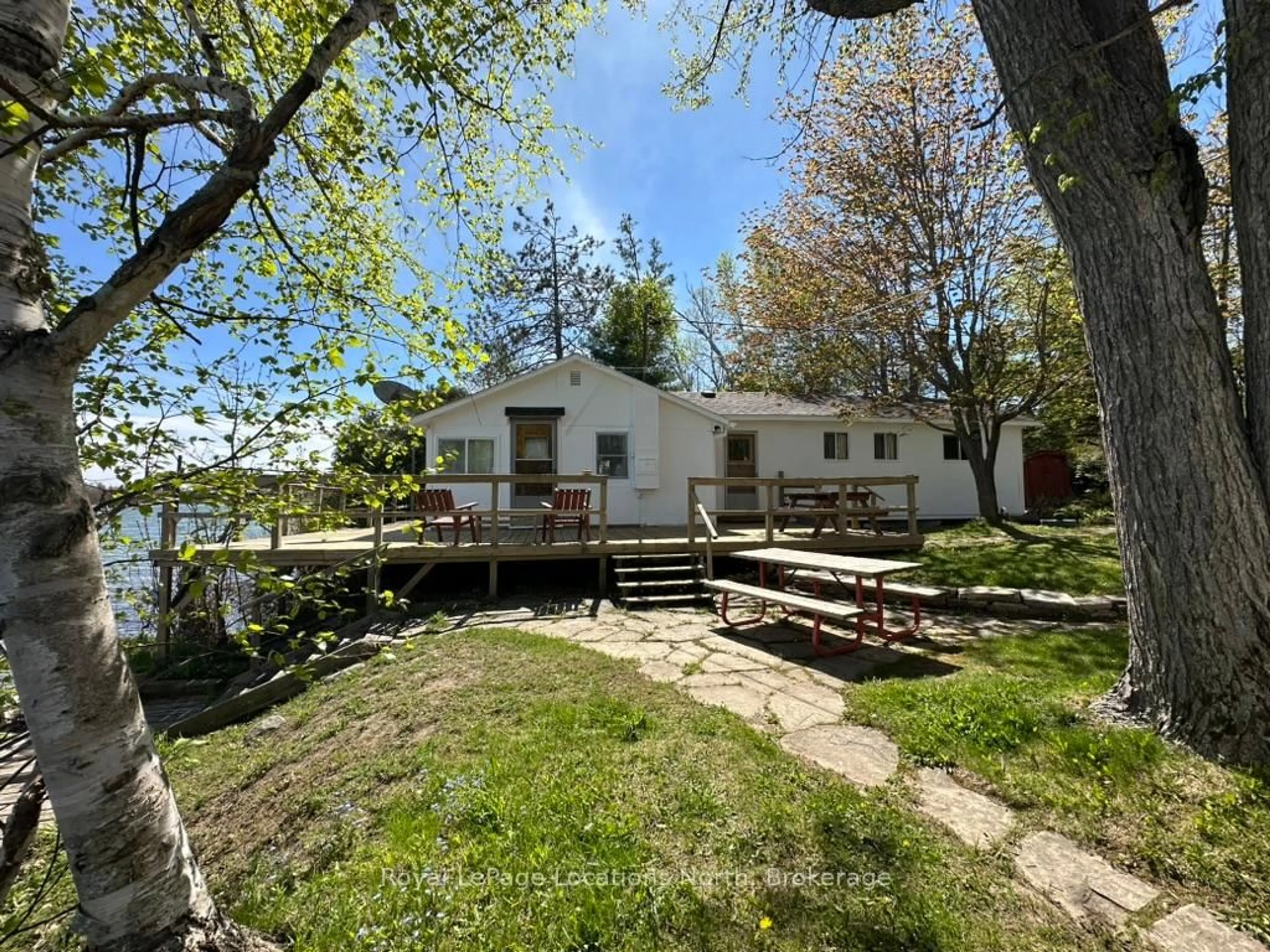 A pic from outside/outdoor area/front of a property/back of a property/a pic from drone, water/lake/river/ocean view for 62 Miller Lake Shore Rd, Northern Bruce Peninsula Ontario N0H 1Z0