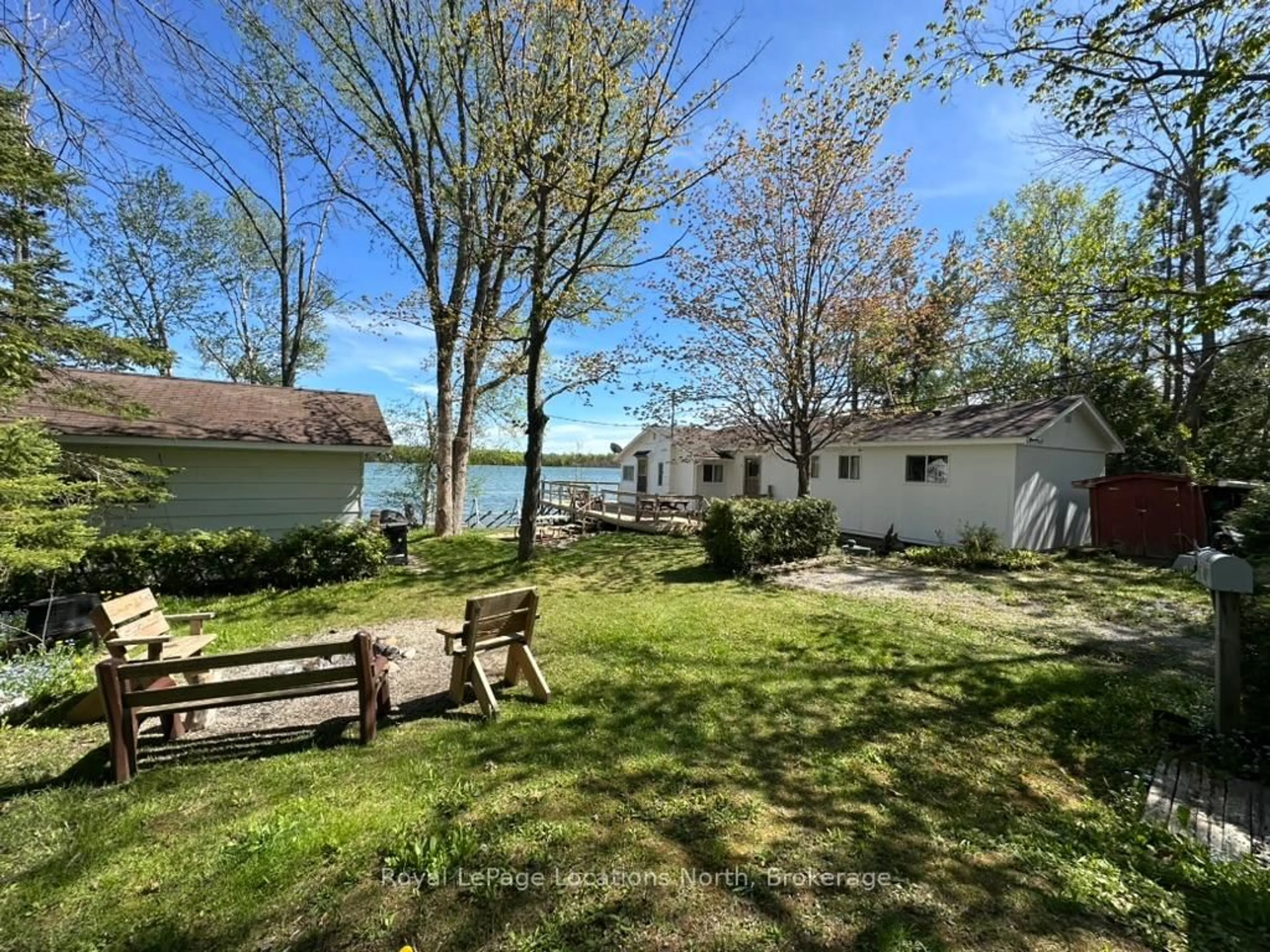 A pic from outside/outdoor area/front of a property/back of a property/a pic from drone, water/lake/river/ocean view for 62 Miller Lake Shore Rd, Northern Bruce Peninsula Ontario N0H 1Z0