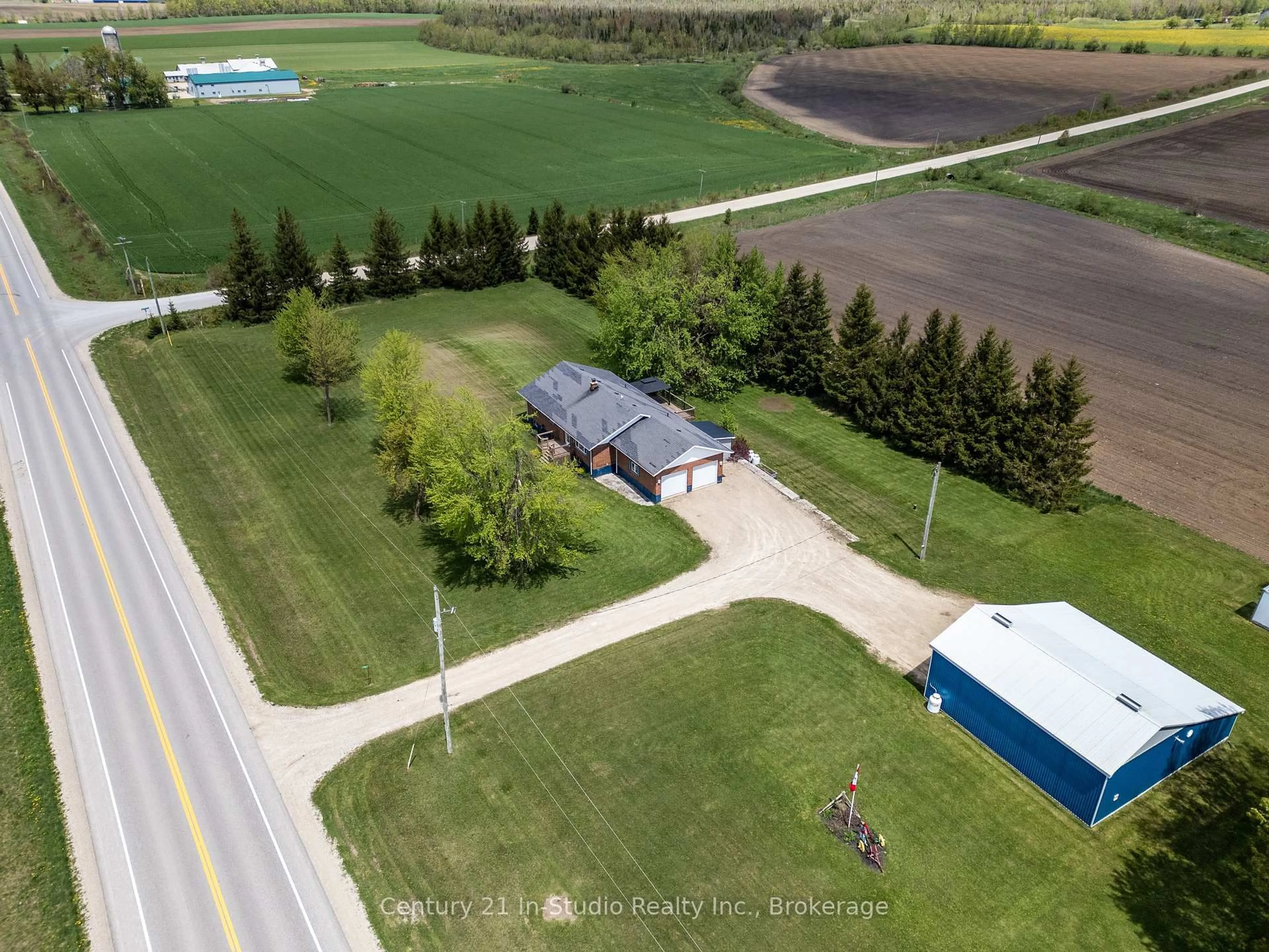 A pic from outside/outdoor area/front of a property/back of a property/a pic from drone, street for 311817 Grey Road 8, Southgate Ontario N0C 1B0