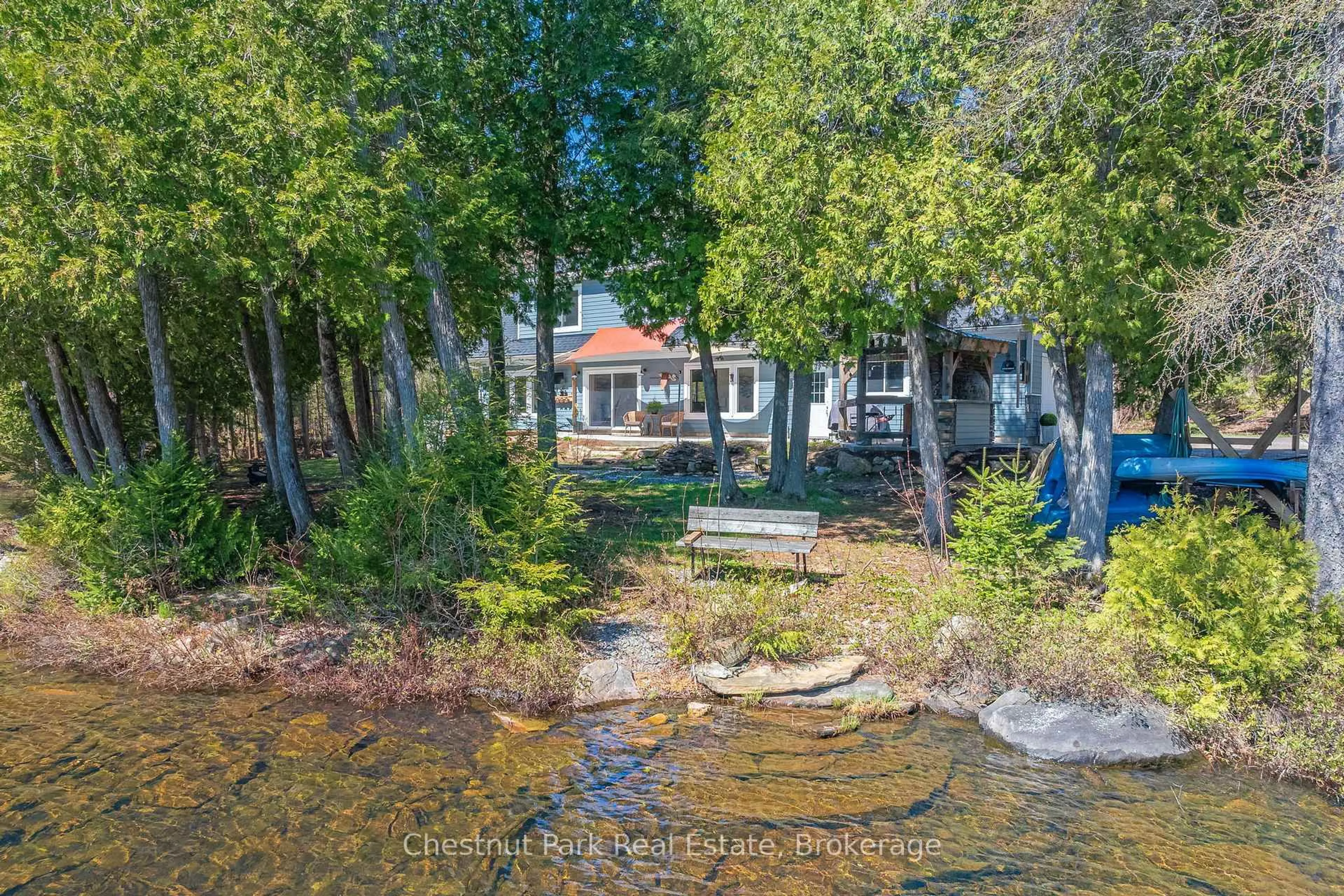 A pic from outside/outdoor area/front of a property/back of a property/a pic from drone, water/lake/river/ocean view for 1030 Brooks Lake Rd, Lake of Bays Ontario P1H 2J6