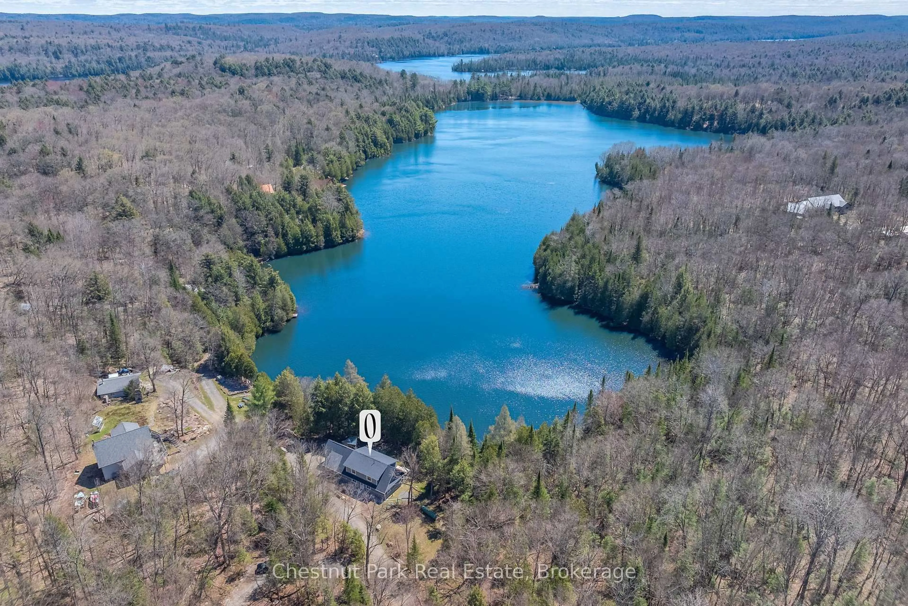 A pic from outside/outdoor area/front of a property/back of a property/a pic from drone, water/lake/river/ocean view for 1030 Brooks Lake Rd, Lake of Bays Ontario P1H 2J6