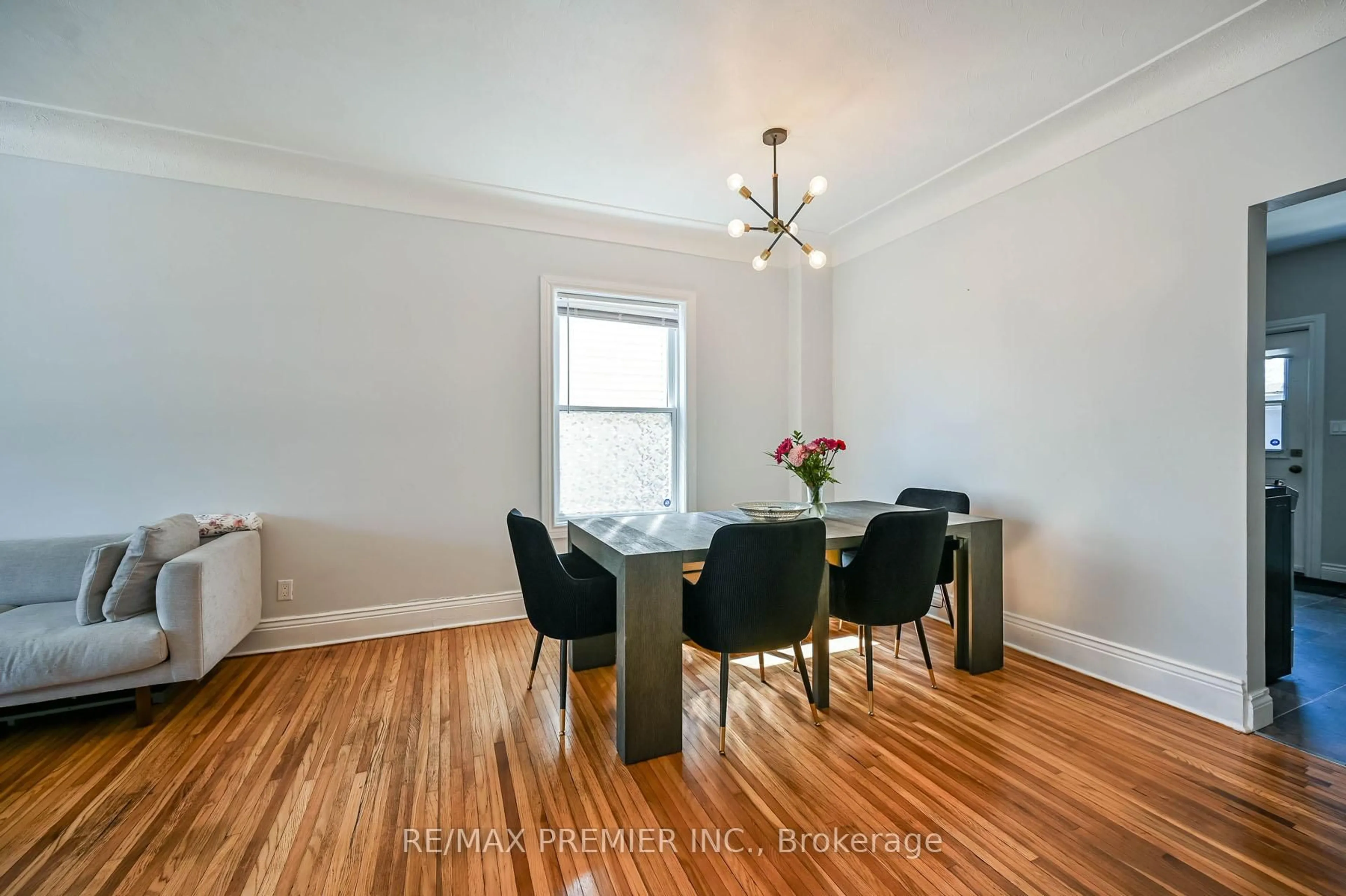 Dining room, wood/laminate floor for 53 Douglas Ave, Hamilton Ontario L8L 5R2