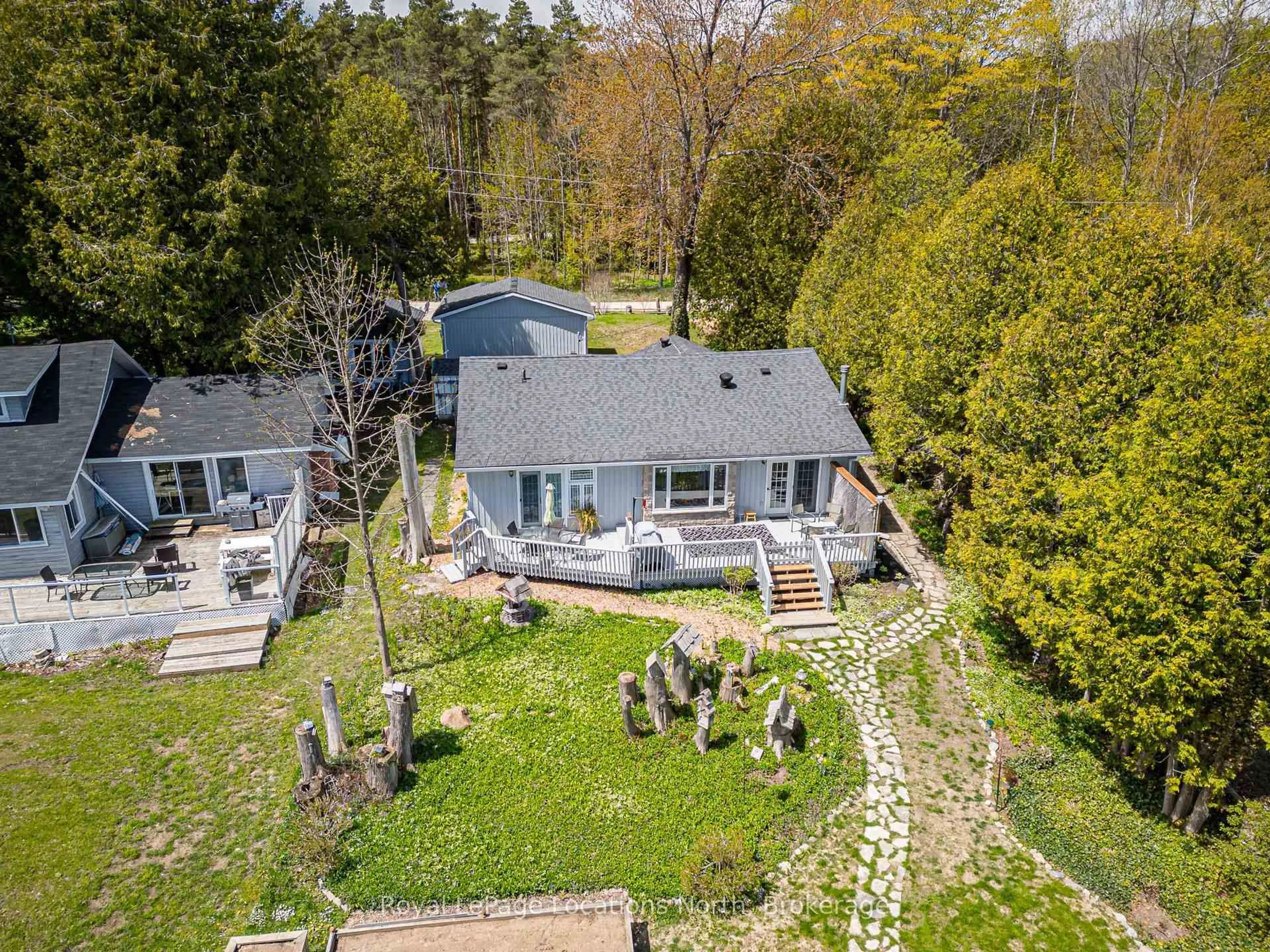 A pic from outside/outdoor area/front of a property/back of a property/a pic from drone, unknown for 117 Kiowana Beach Rd, Meaford Ontario N4L 1W5