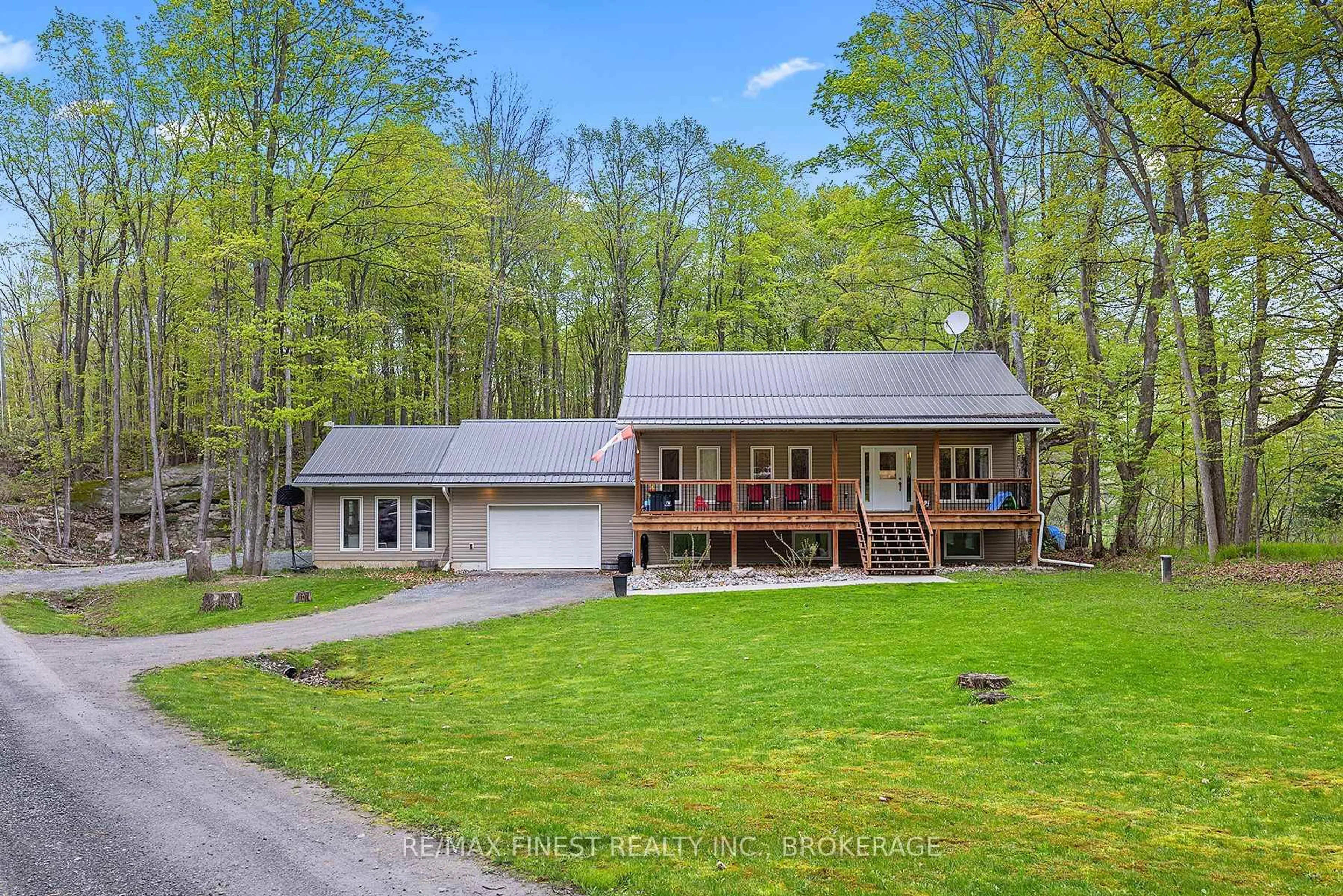 A pic from outside/outdoor area/front of a property/back of a property/a pic from drone, unknown for 8 ENCHANTED Lane, Perth Road Ontario K0H 2L0