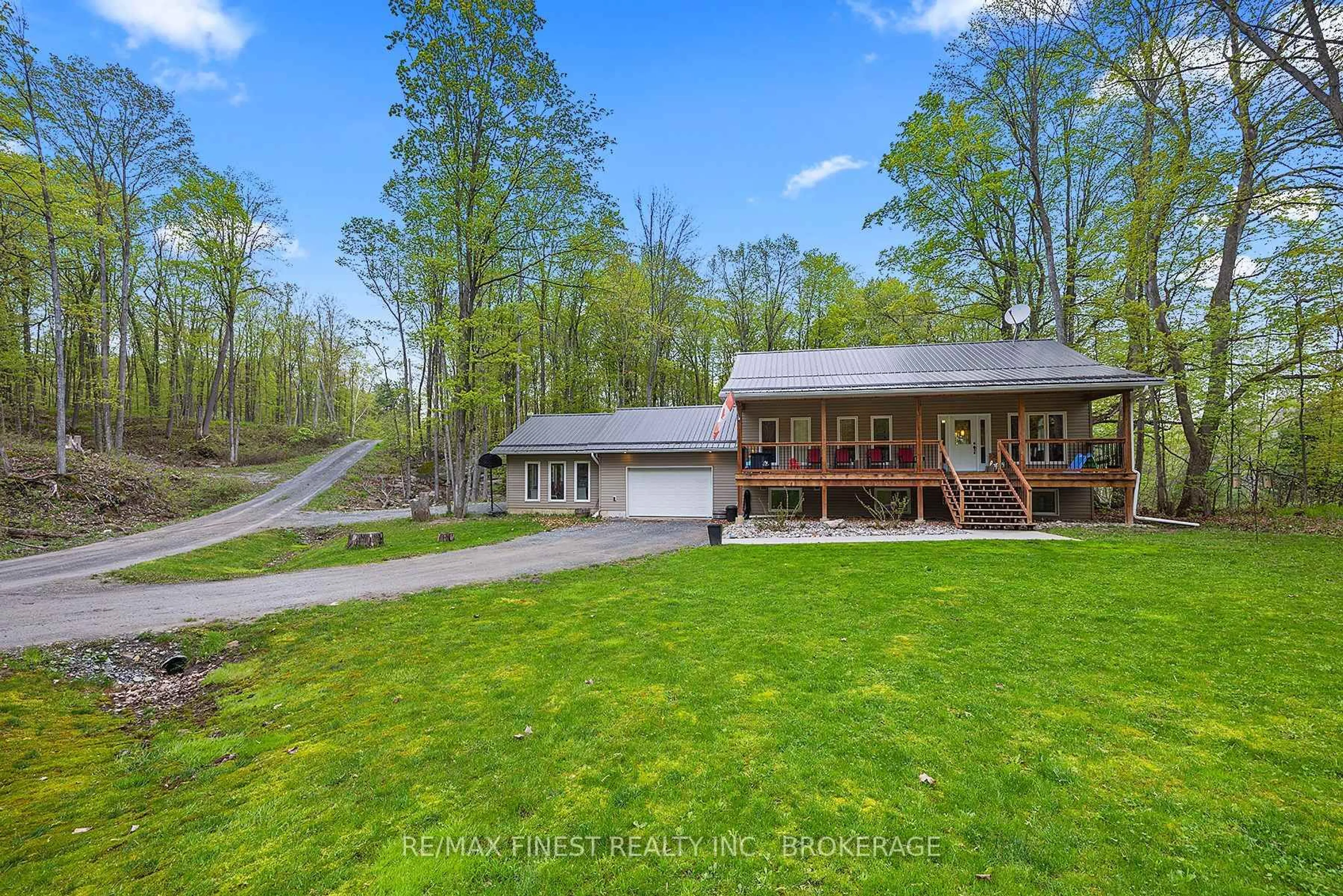 A pic from outside/outdoor area/front of a property/back of a property/a pic from drone, water/lake/river/ocean view for 8 ENCHANTED Lane, Perth Road Ontario K0H 2L0