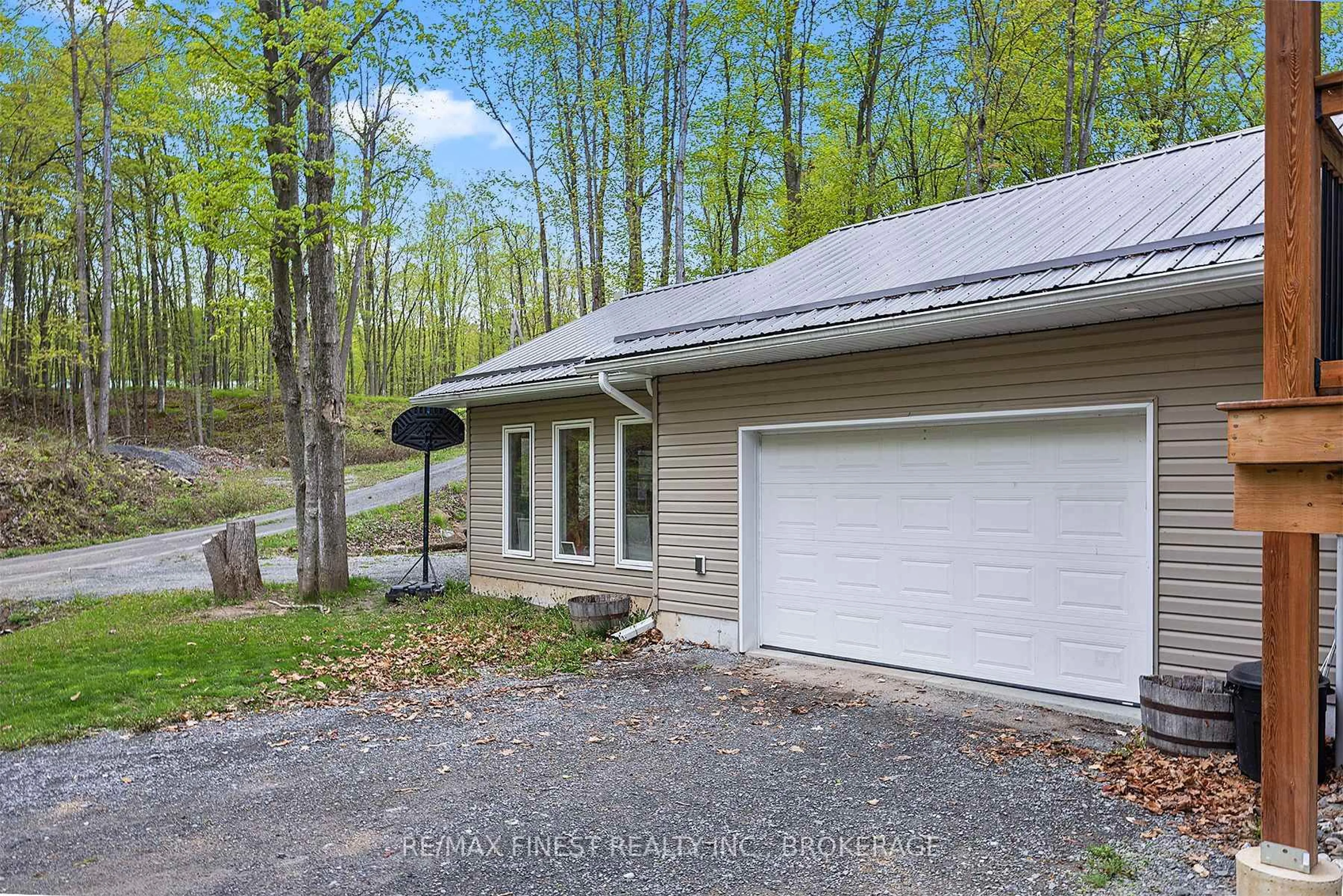 A pic from outside/outdoor area/front of a property/back of a property/a pic from drone, unknown for 8 ENCHANTED Lane, Perth Road Ontario K0H 2L0