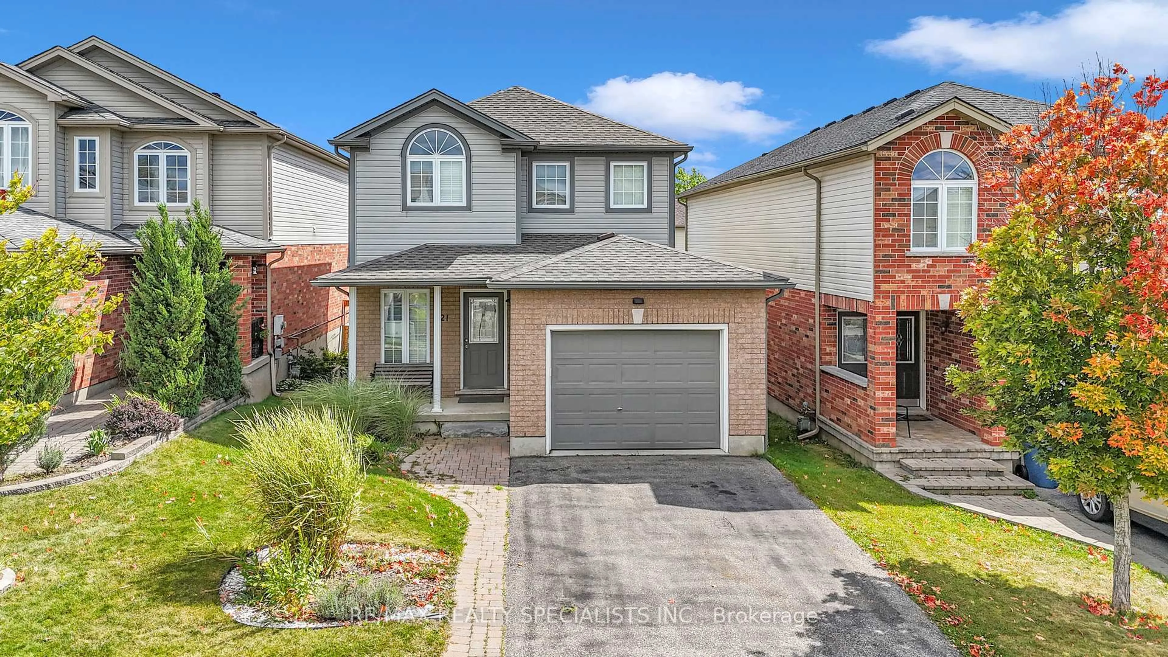 Home with brick exterior material, street for 21 Henderson Dr, Guelph Ontario N1E 0A1
