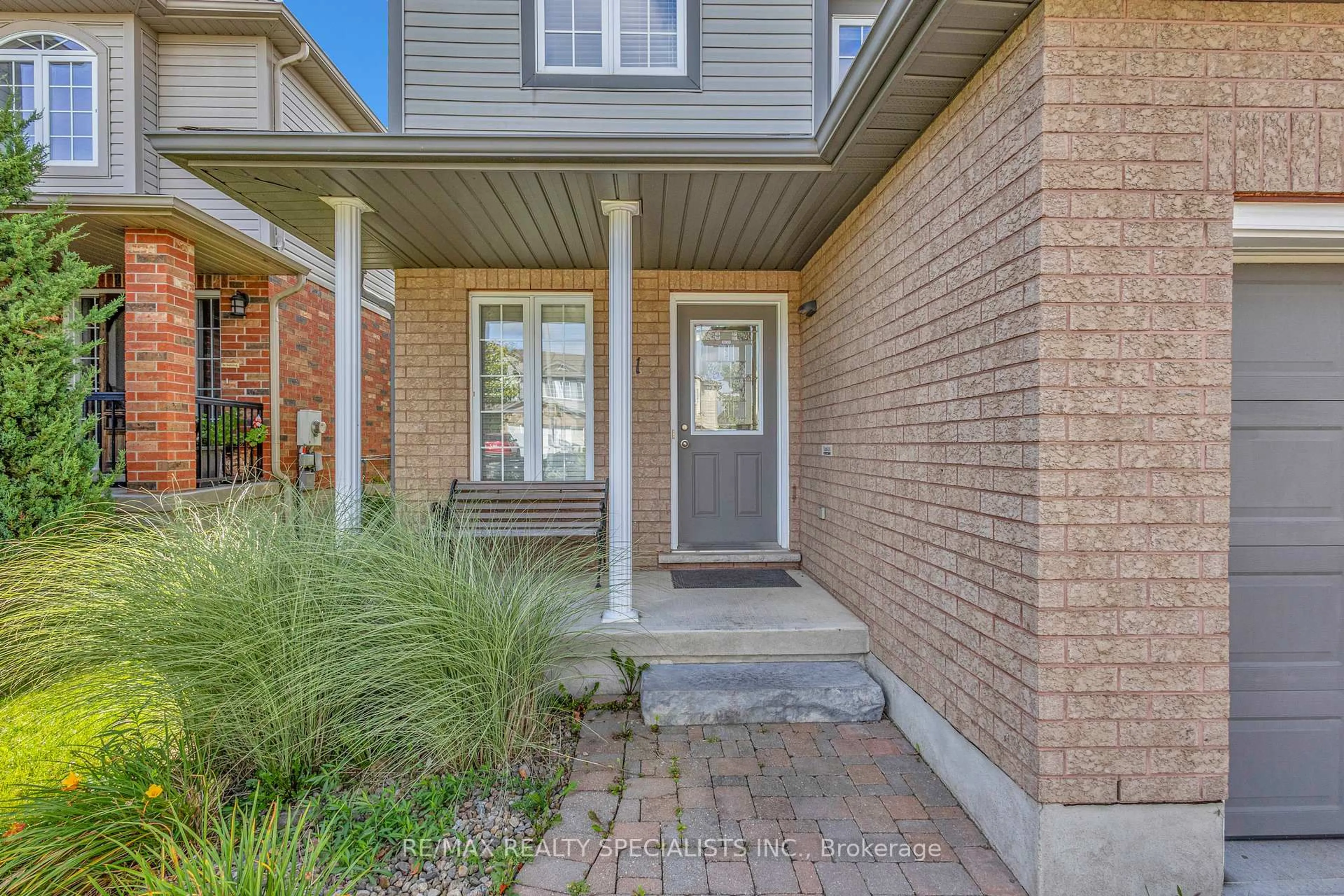 Home with brick exterior material, street for 21 Henderson Dr, Guelph Ontario N1E 0A1