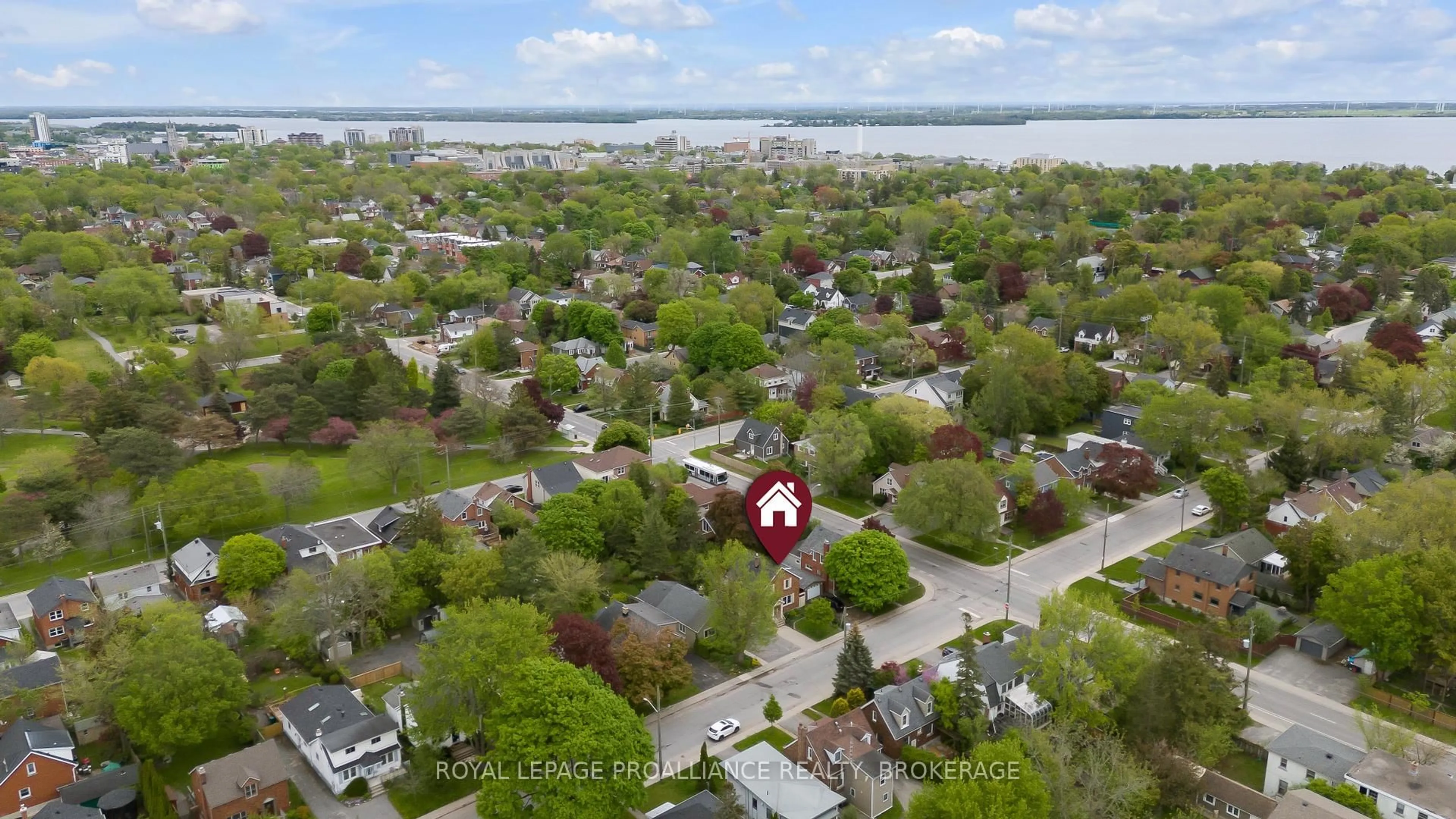 A pic from outside/outdoor area/front of a property/back of a property/a pic from drone, water/lake/river/ocean view for 295 College St, Kingston Ontario K7L 4M3