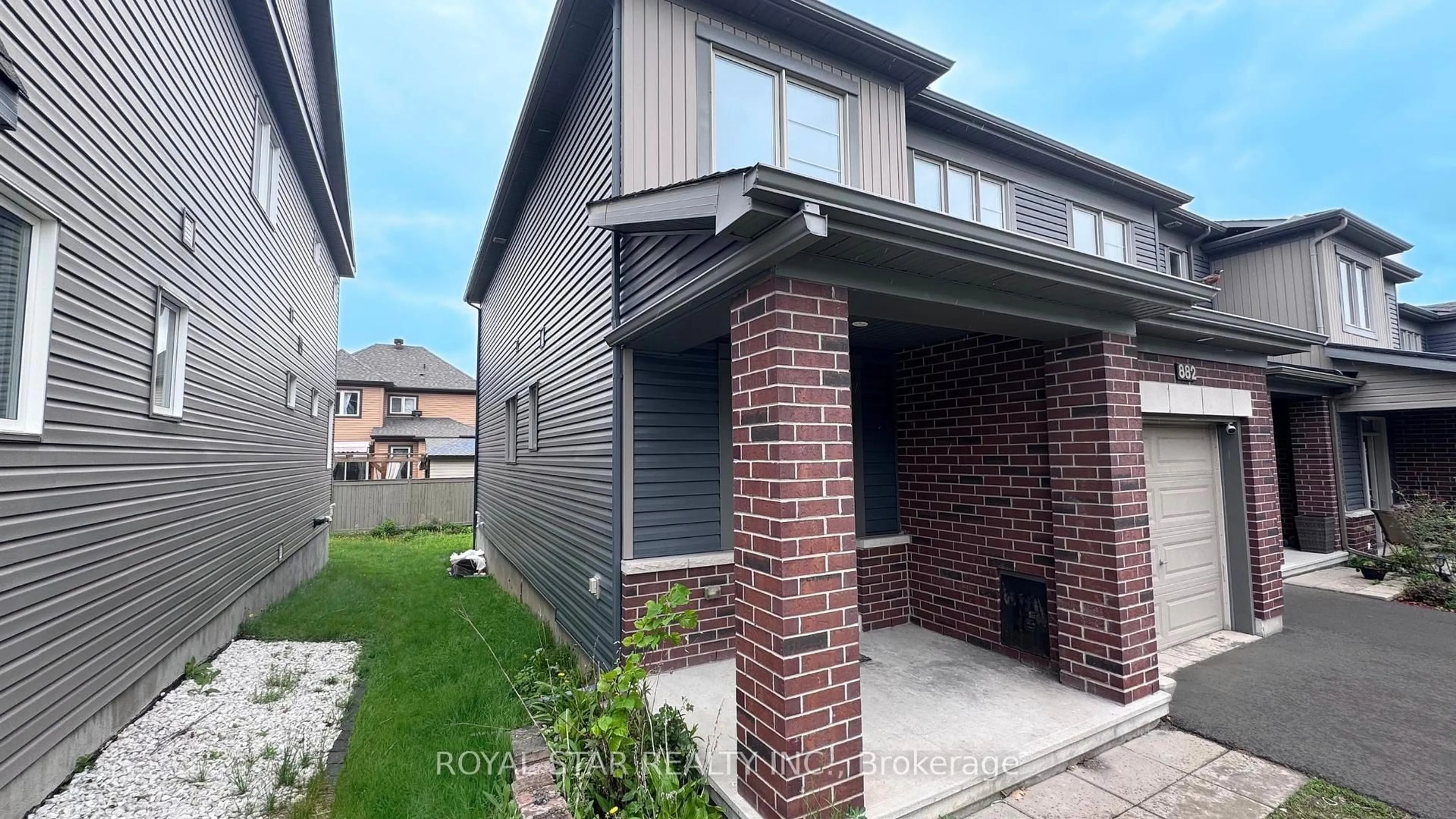 Home with brick exterior material, street for 882 Kilbirnie Dr, Ottawa Ontario K2J 6G5