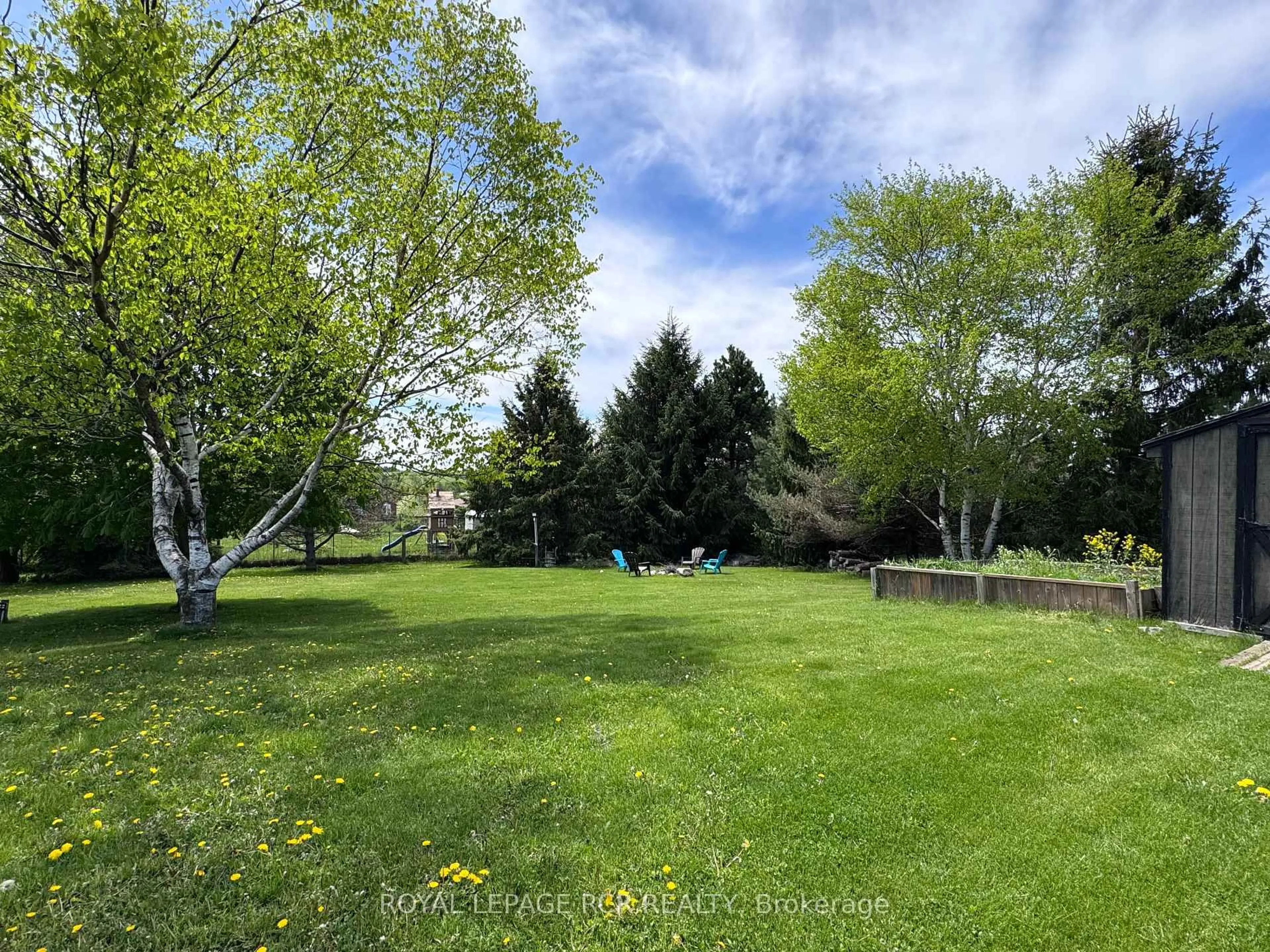 A pic from outside/outdoor area/front of a property/back of a property/a pic from drone, forest/trees view for 18 Peter St, Amaranth Ontario L9W 5Z8