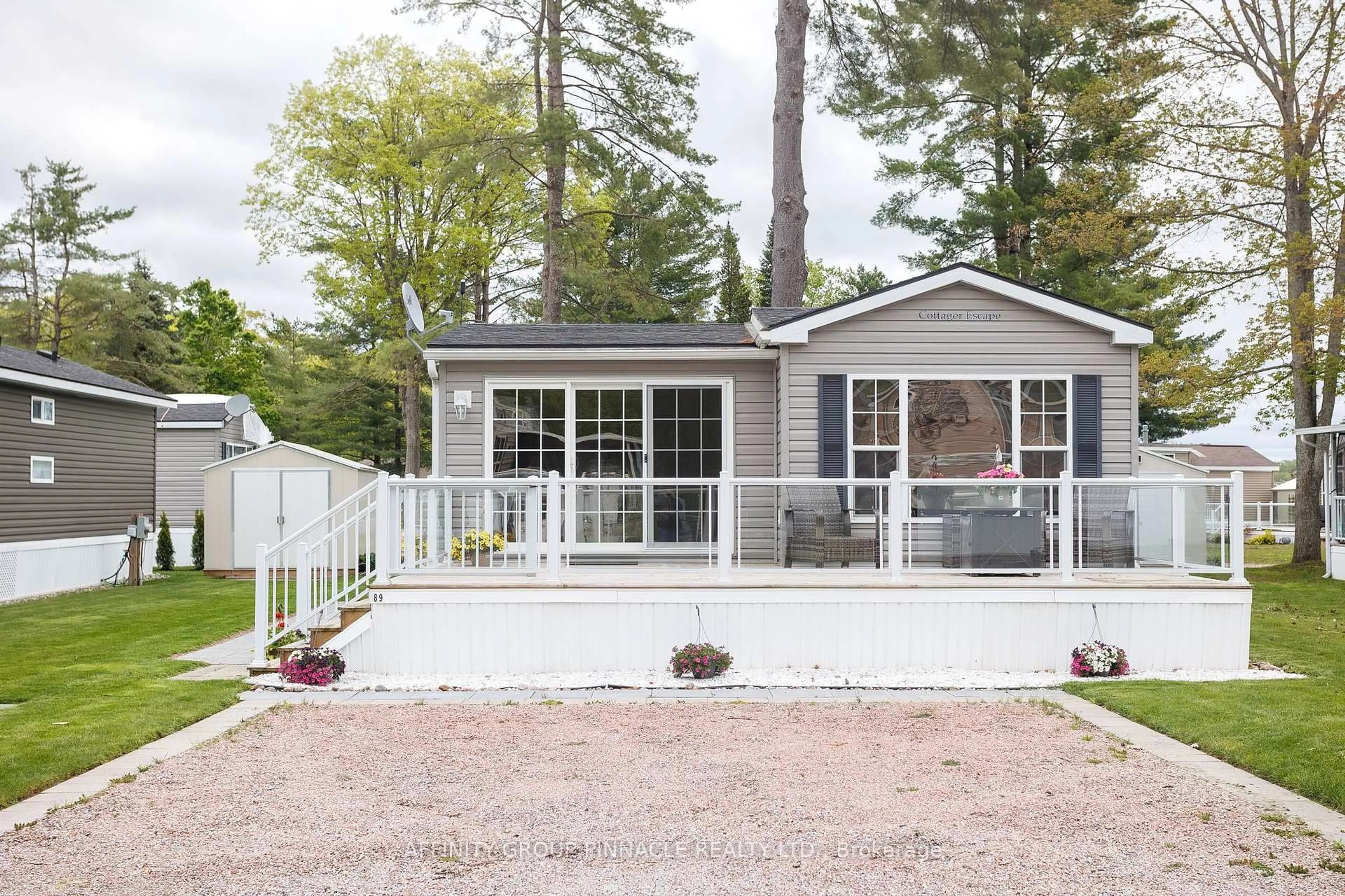 Home with vinyl exterior material, street for 33 Melody Bay Rd #89, Trent Lakes Ontario K0L 1J0