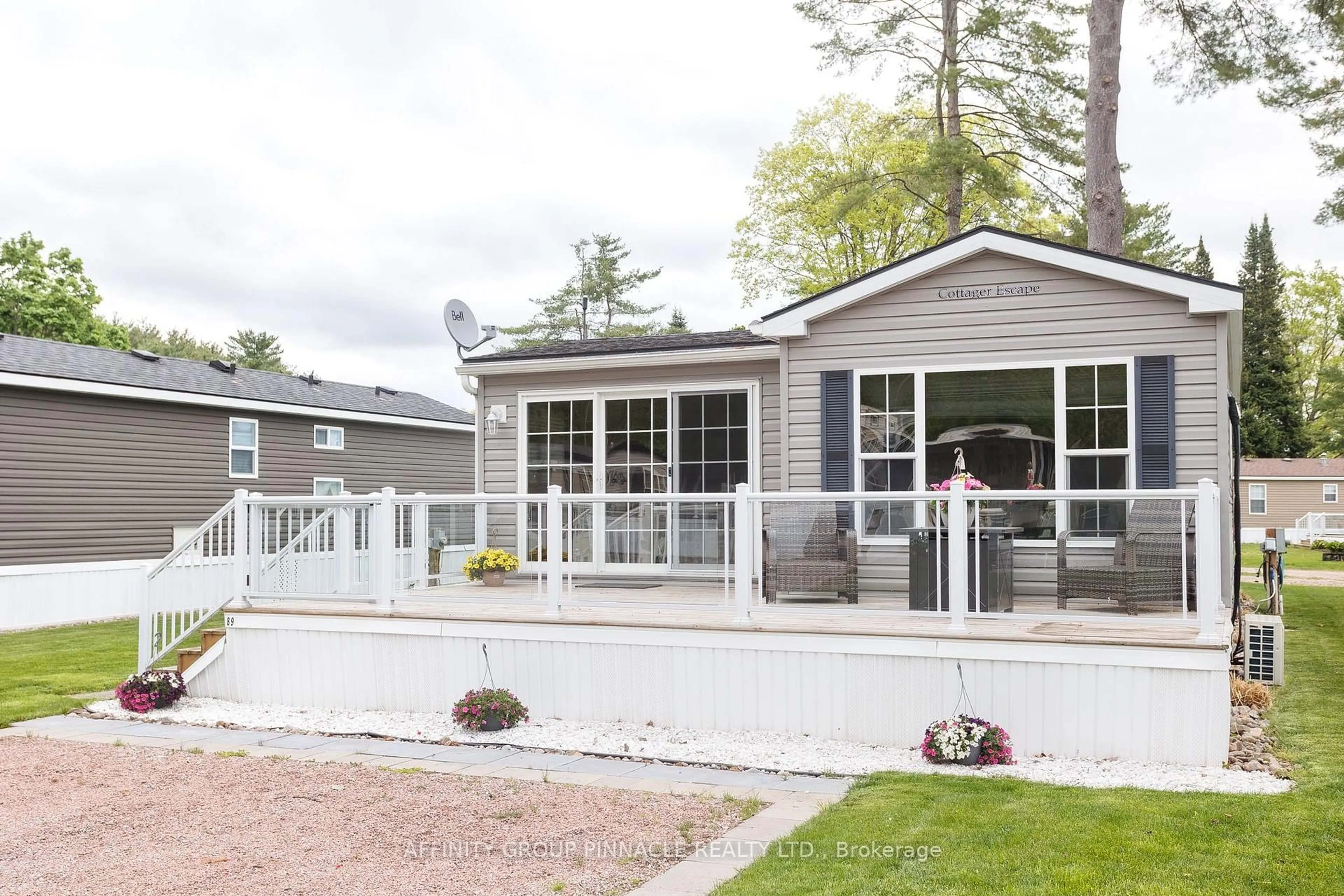 Home with vinyl exterior material, street for 33 Melody Bay Rd #89, Trent Lakes Ontario K0L 1J0