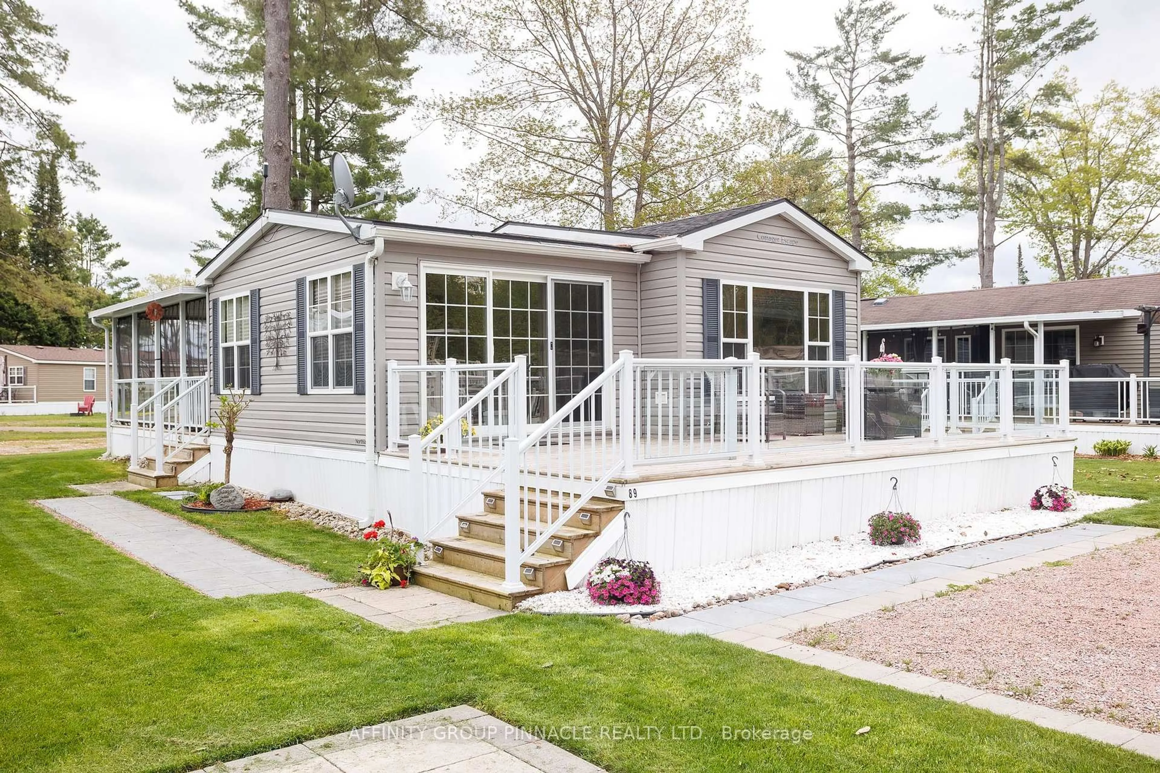 Home with vinyl exterior material, street for 33 Melody Bay Rd #89, Trent Lakes Ontario K0L 1J0
