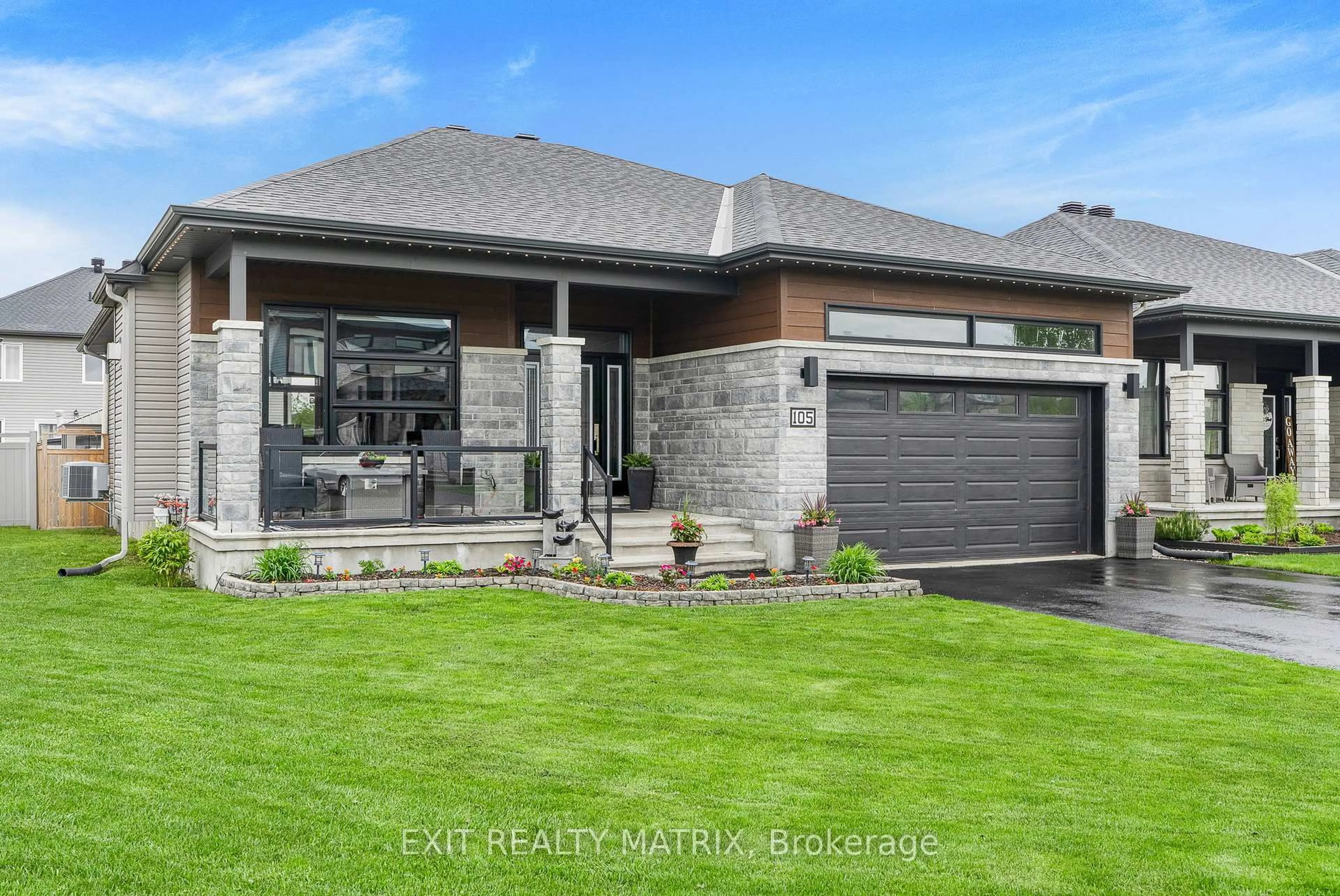 Home with brick exterior material, street for 105 Lyon St, Russell Ontario K0A 1M0