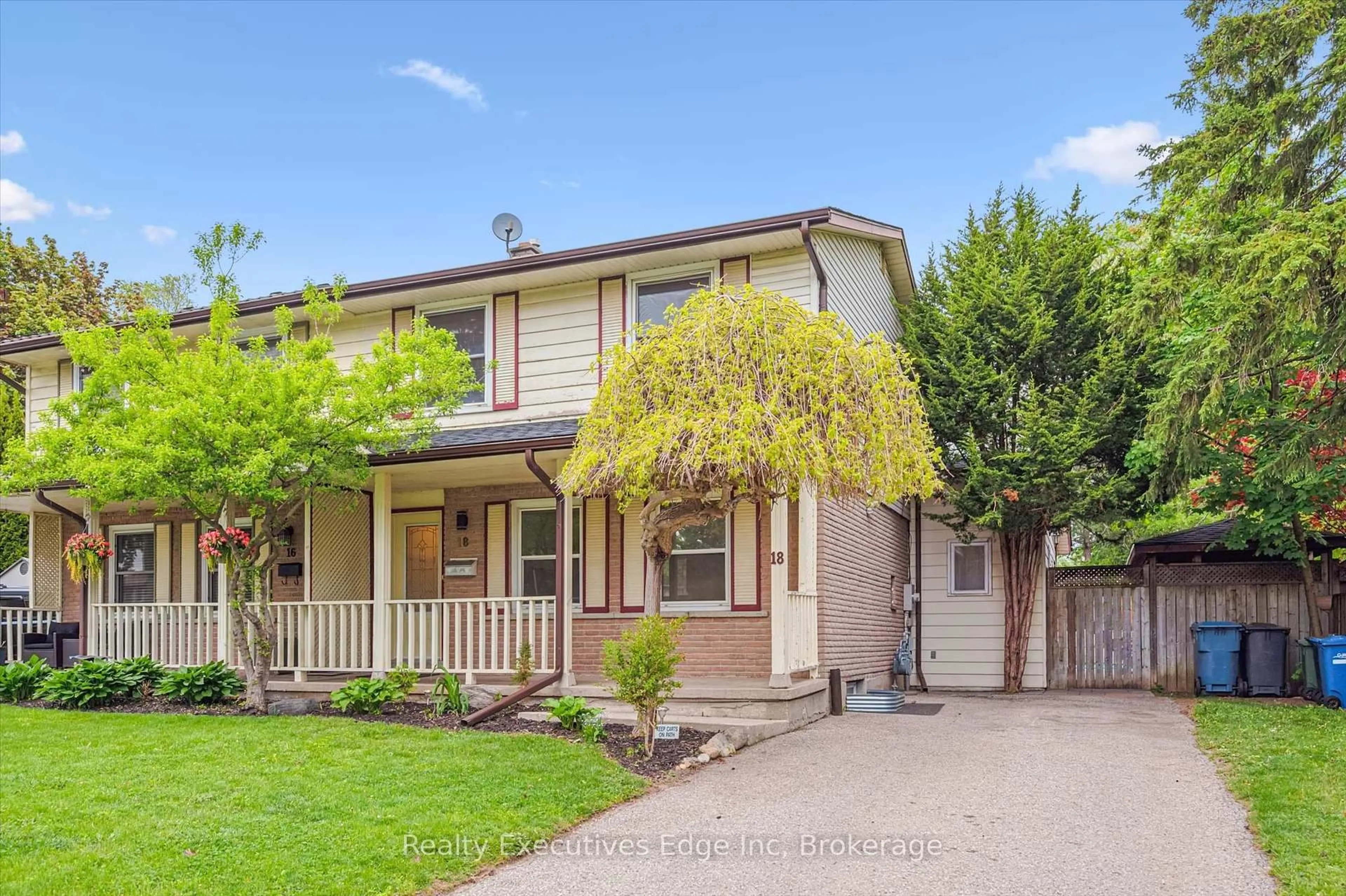 Home with vinyl exterior material, street for 18 Windermere Crt, Guelph Ontario N1E 3L4