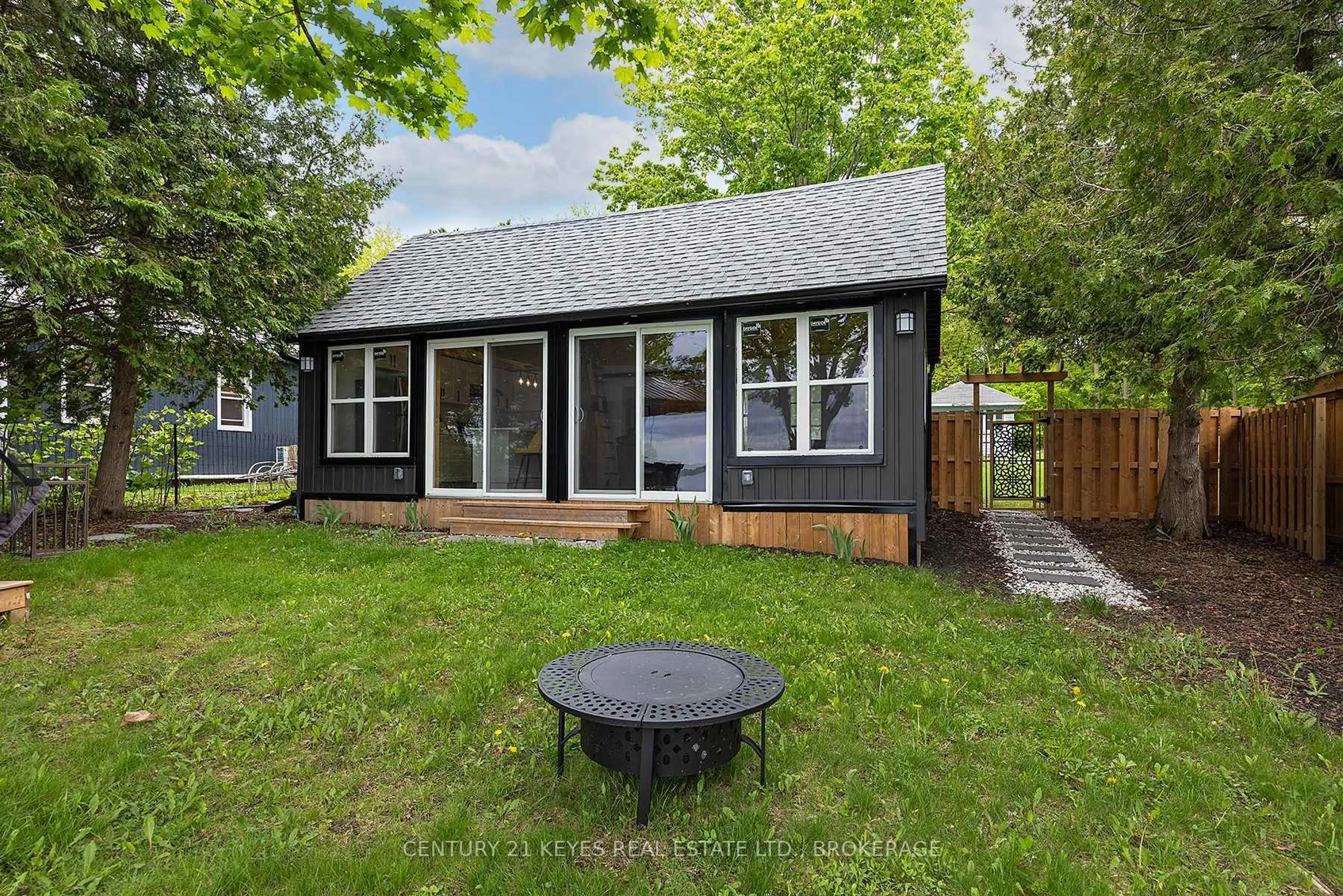 Home with vinyl exterior material, street for 38 Dark Island Lane, Gananoque Ontario K7G 2V4