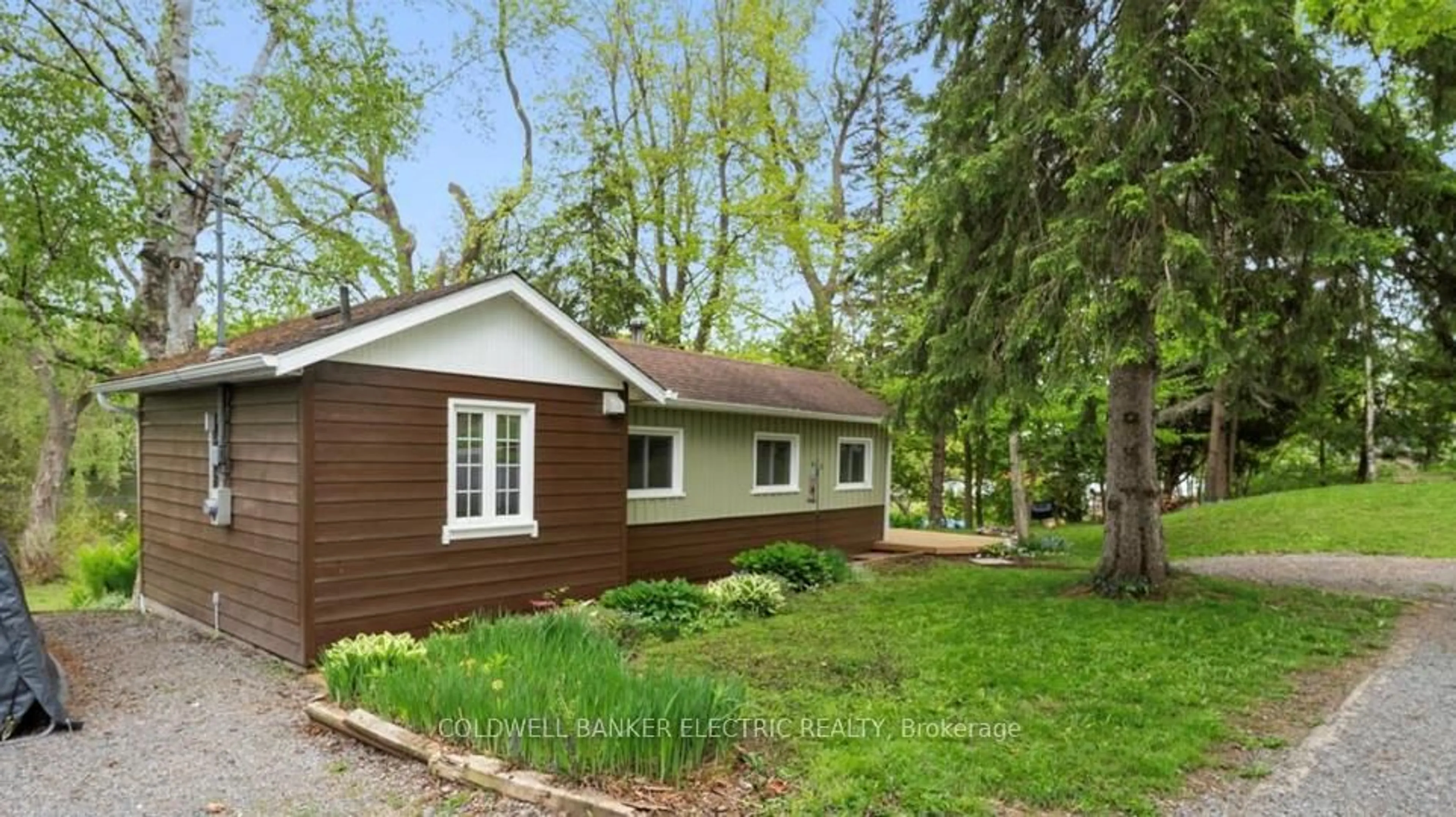 Home with vinyl exterior material, street for 979 Water St, Douro-Dummer Ontario K0L 3A0