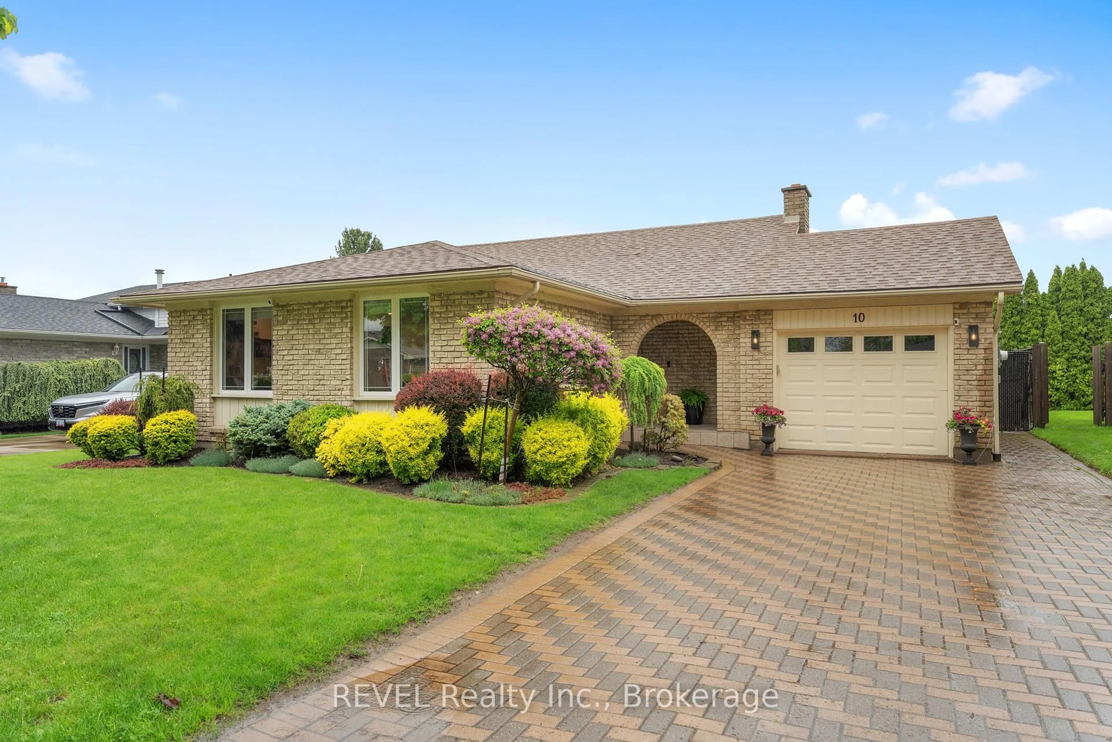 Home with brick exterior material, street for 10 Belair Dr, St. Catharines Ontario L2N 6W5