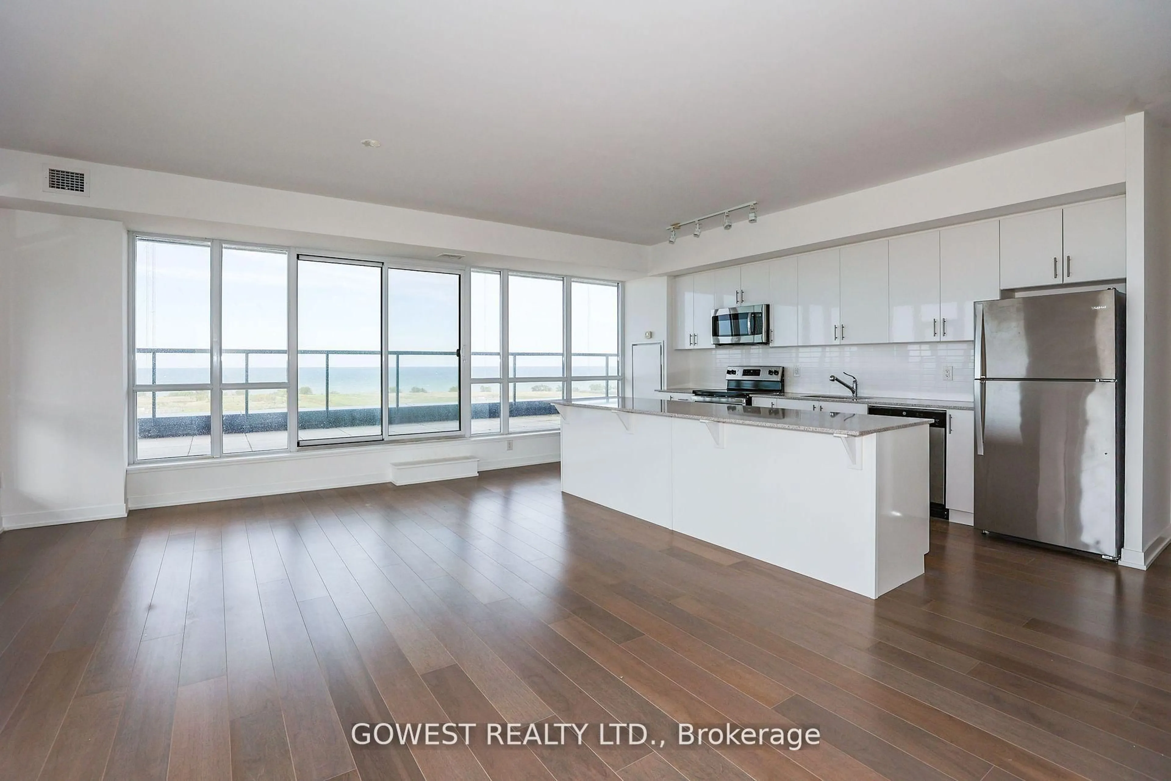 Open concept kitchen, wood/laminate floor for 550 North Service Rd #705, Grimsby Ontario L3M 0H9