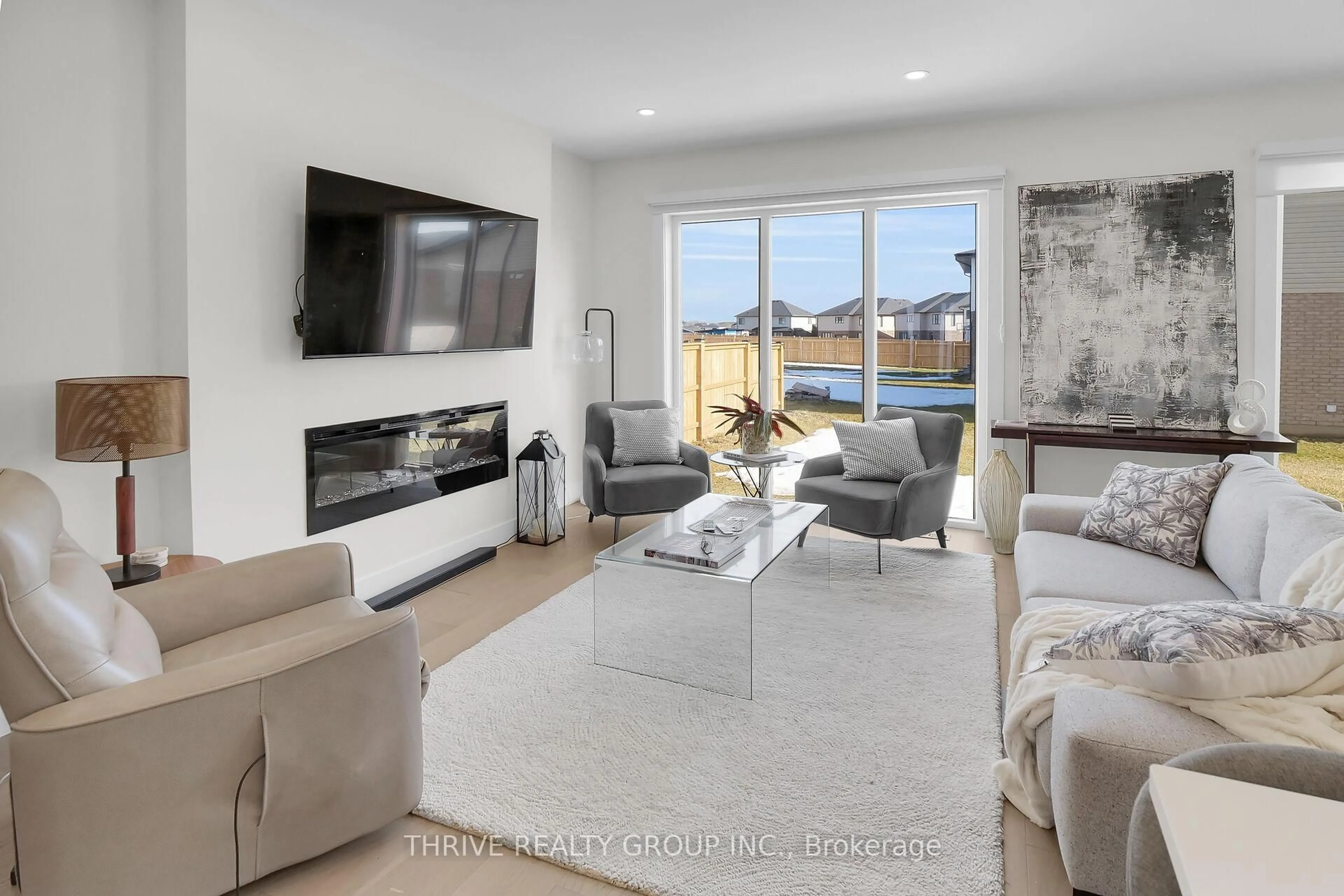 Living room with furniture, unknown for 176 Winlow Way, Middlesex Centre Ontario N0L 1R0