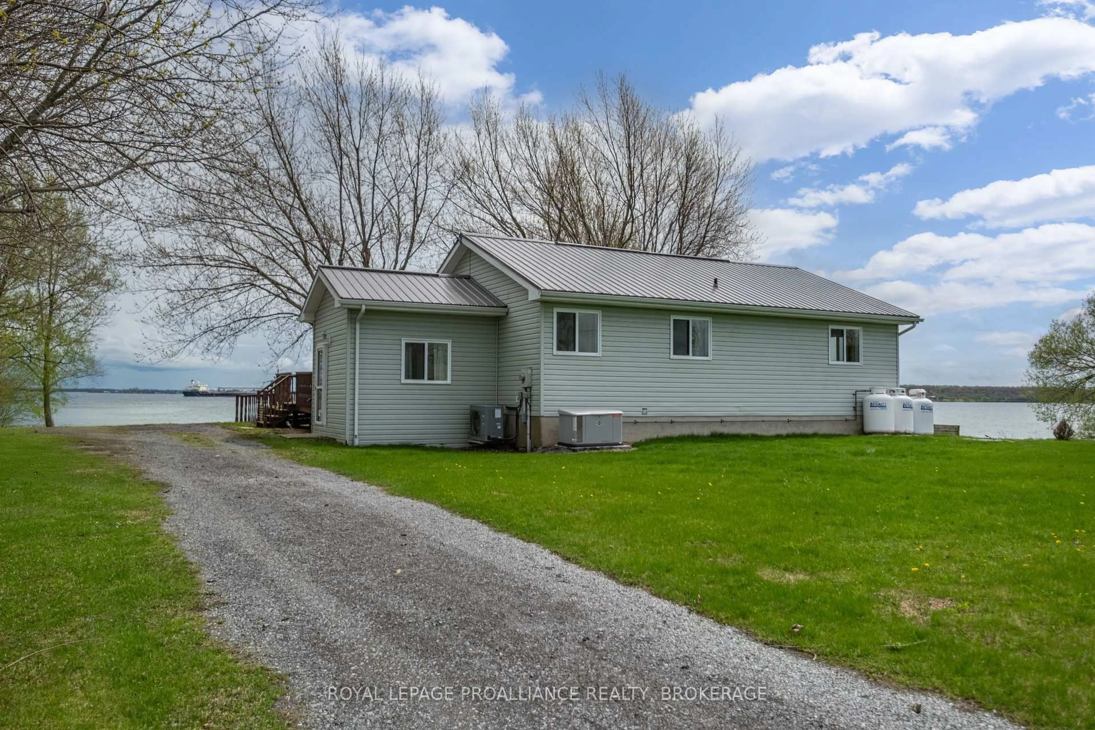 A pic from outside/outdoor area/front of a property/back of a property/a pic from drone, unknown for 4205 Highway 96 N/A, Wolfe Island Ontario K0H 2Y0