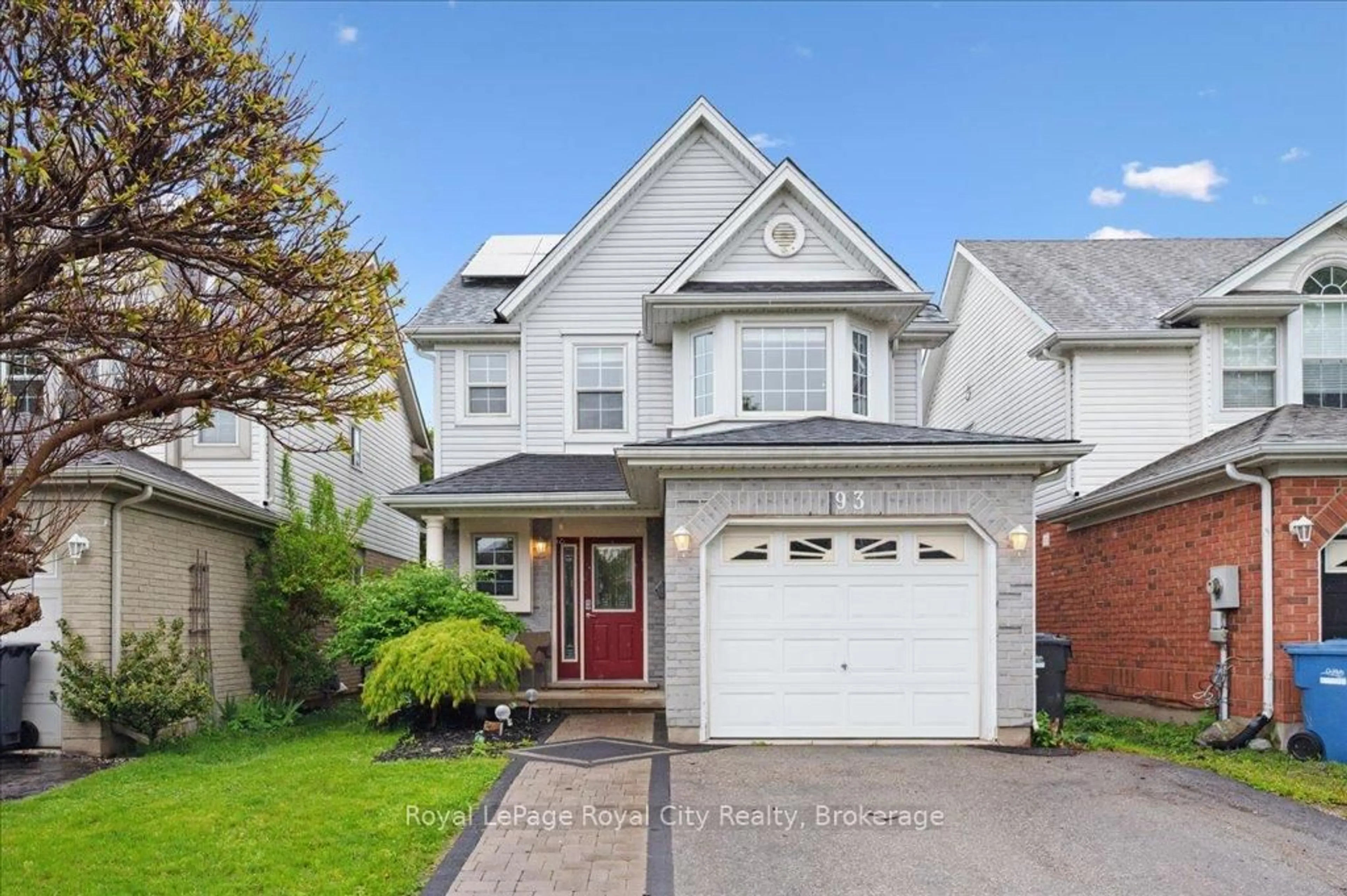 Home with vinyl exterior material, street for 93 Doyle Dr, Guelph Ontario N1G 5B9