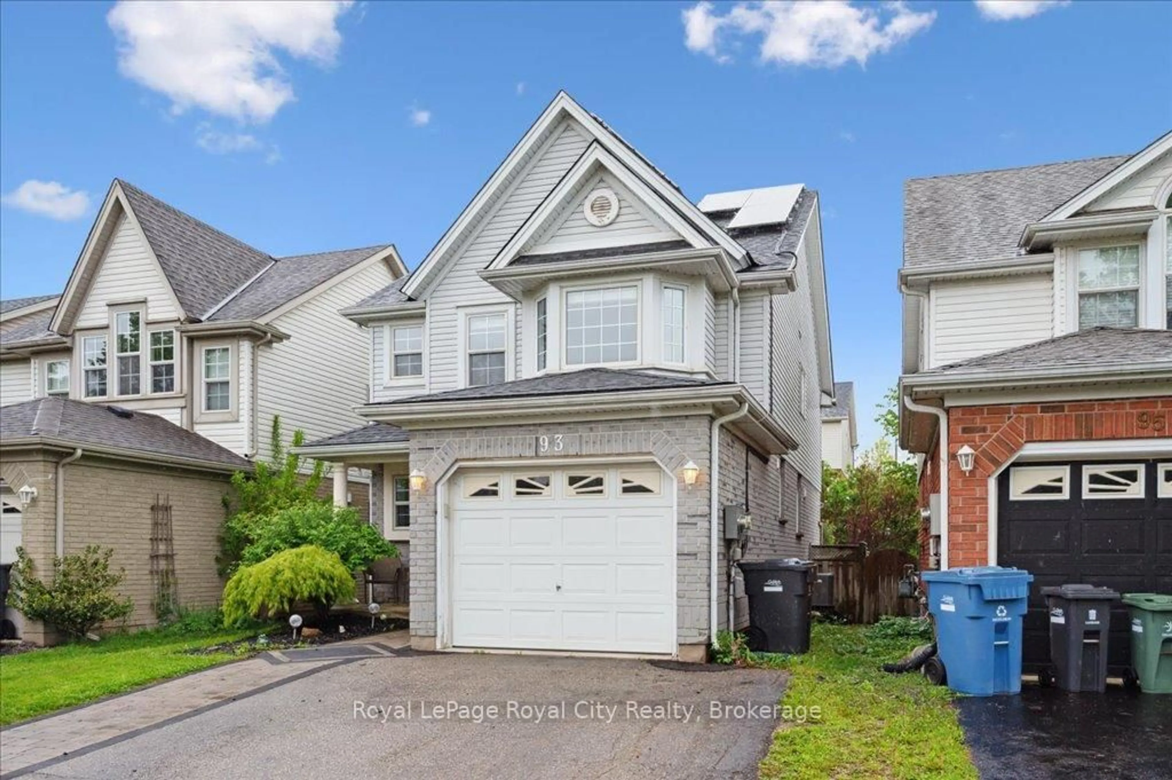Home with vinyl exterior material, street for 93 Doyle Dr, Guelph Ontario N1G 5B9