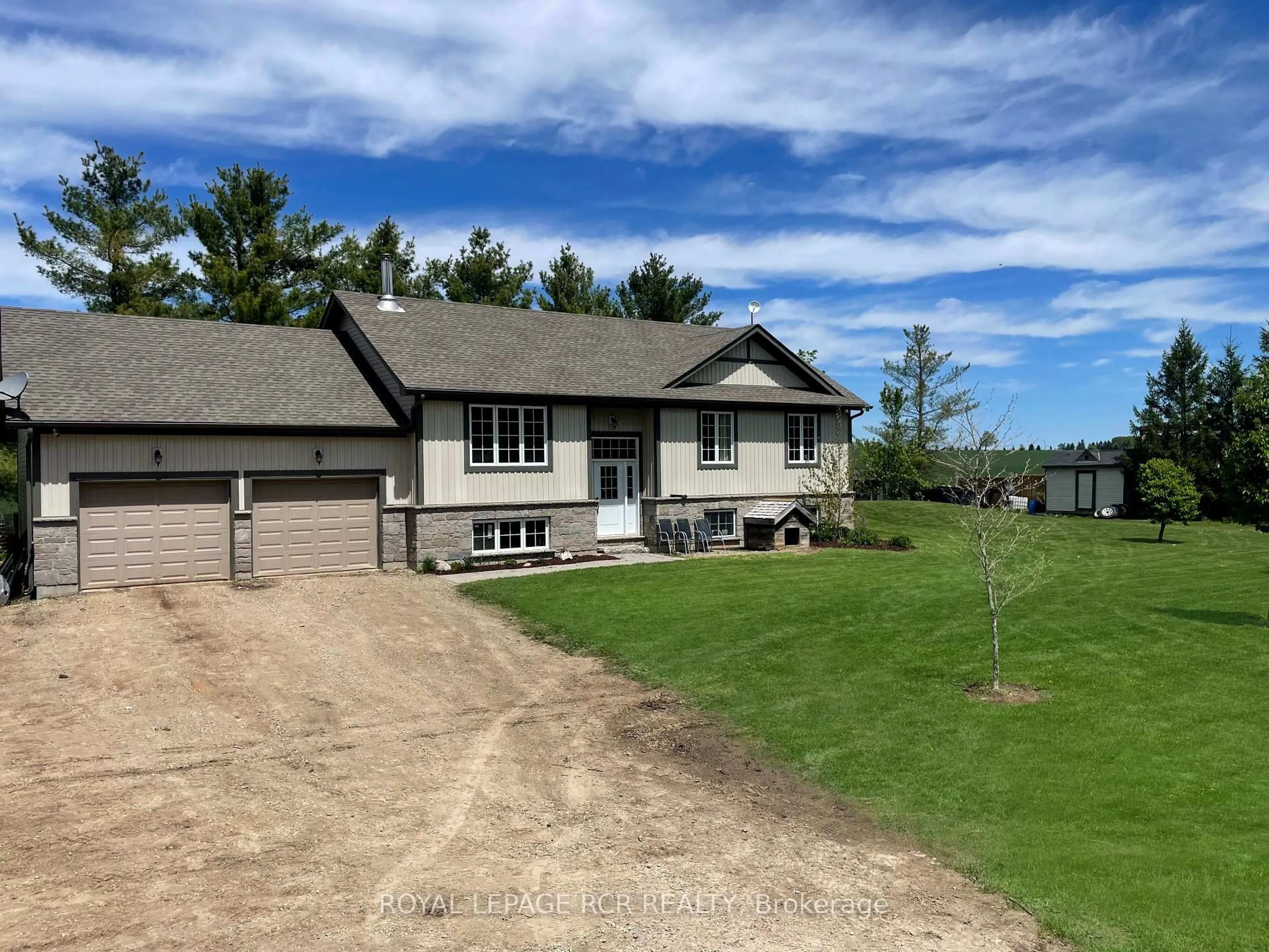 A pic from outside/outdoor area/front of a property/back of a property/a pic from drone, water/lake/river/ocean view for 402187 County Road 15 N/A, East Luther Grand Valley Ontario L9W 3B5