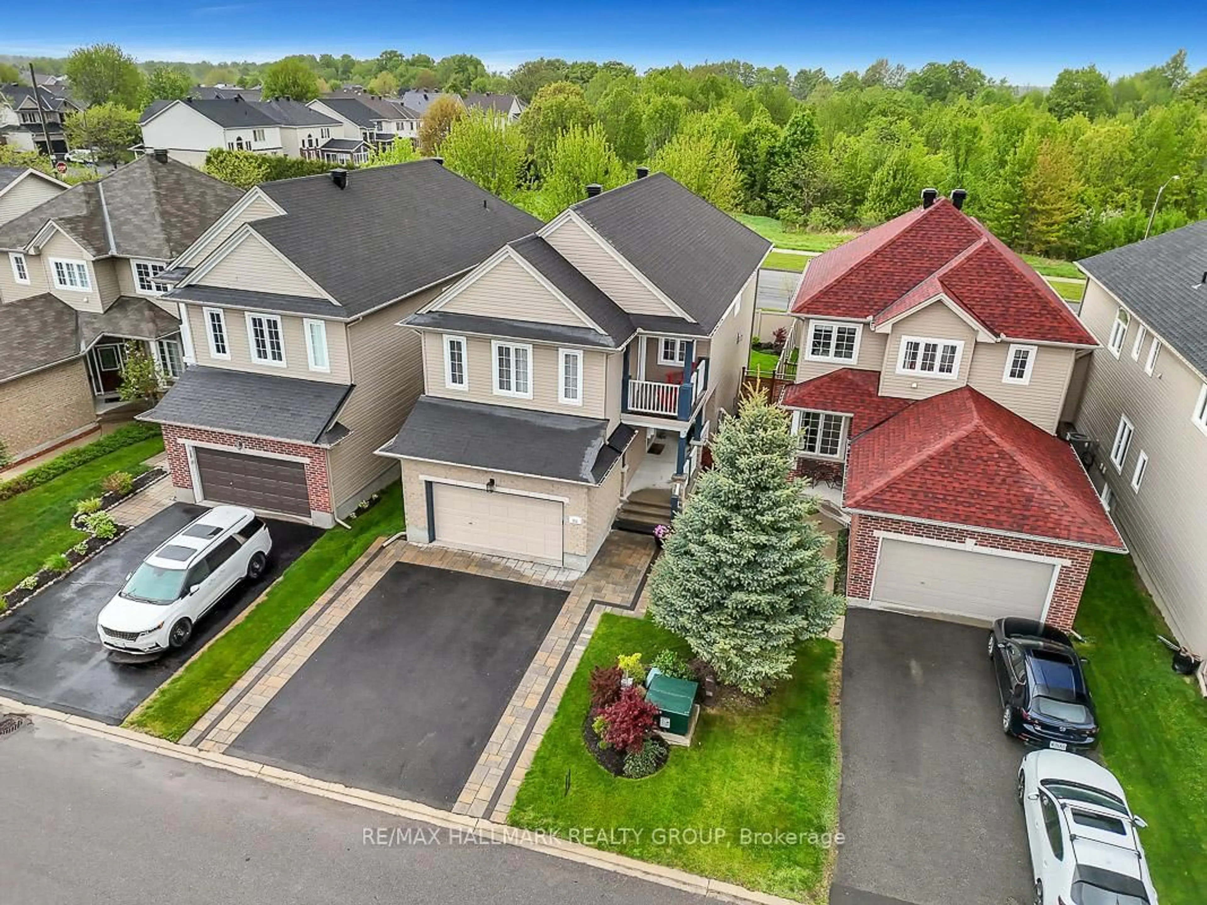 A pic from outside/outdoor area/front of a property/back of a property/a pic from drone, street for 114 August Lily Cres, Ottawa Ontario K1V 2A6